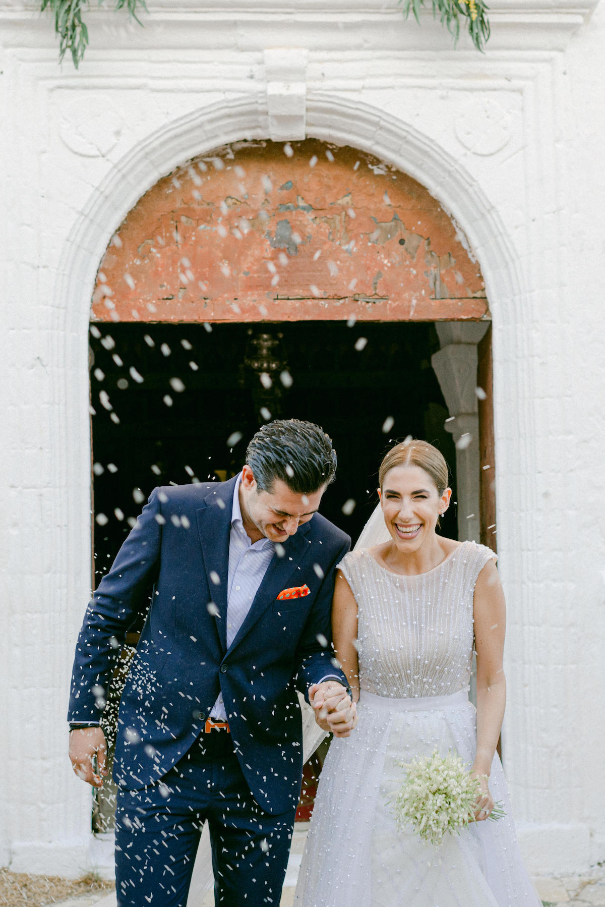 petal toss after wedding ceremony on a greek island