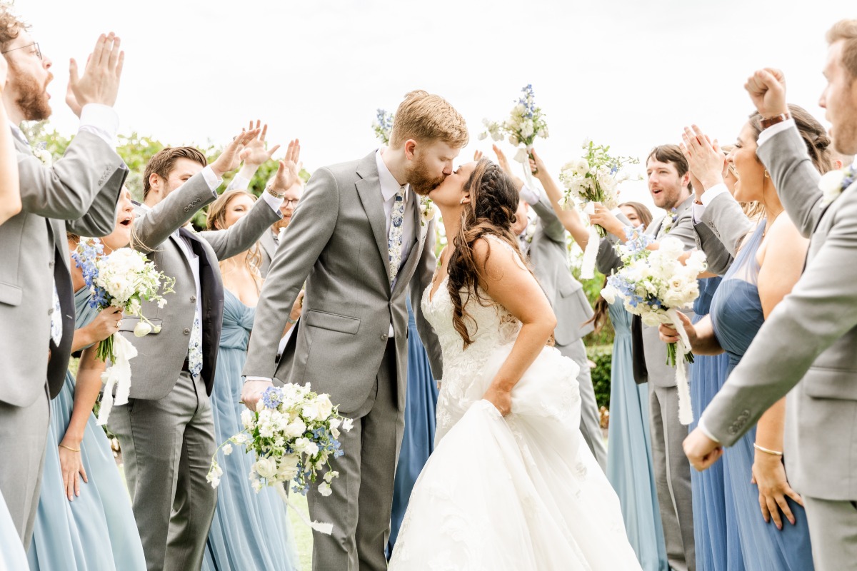 bride and groom kiss at outdoor wedding ceremony in florida