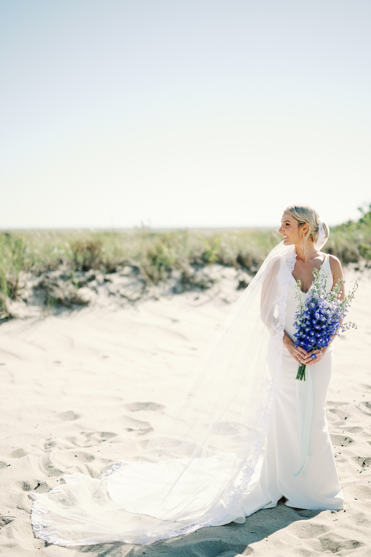 simple wedding dress with decorative veil