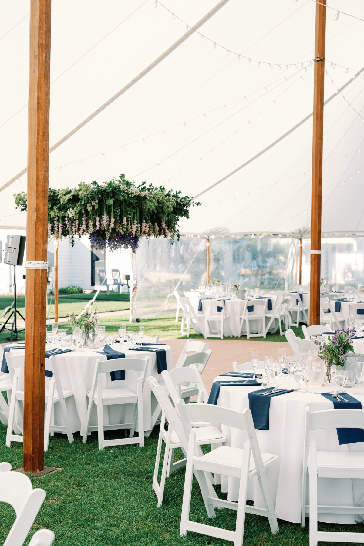 simple reception design with floral chandelier