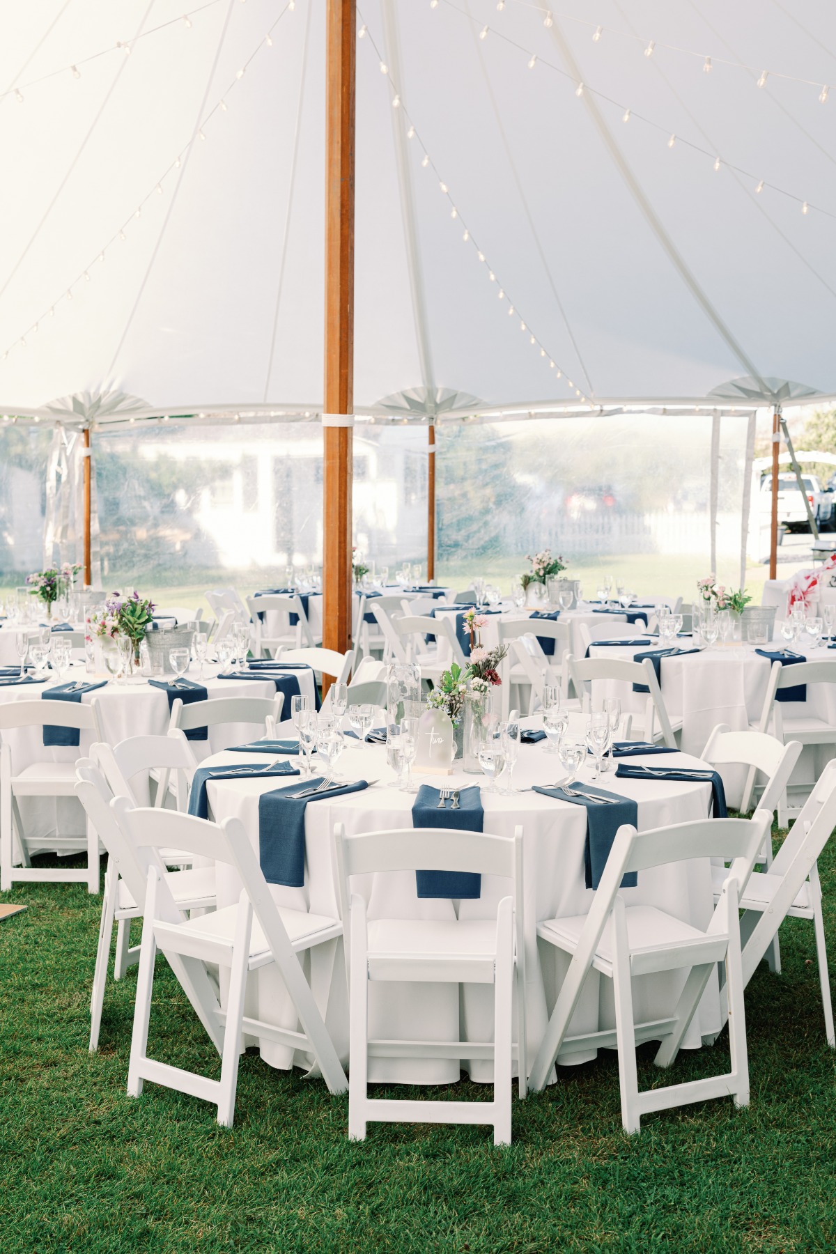 white tent with navy linens