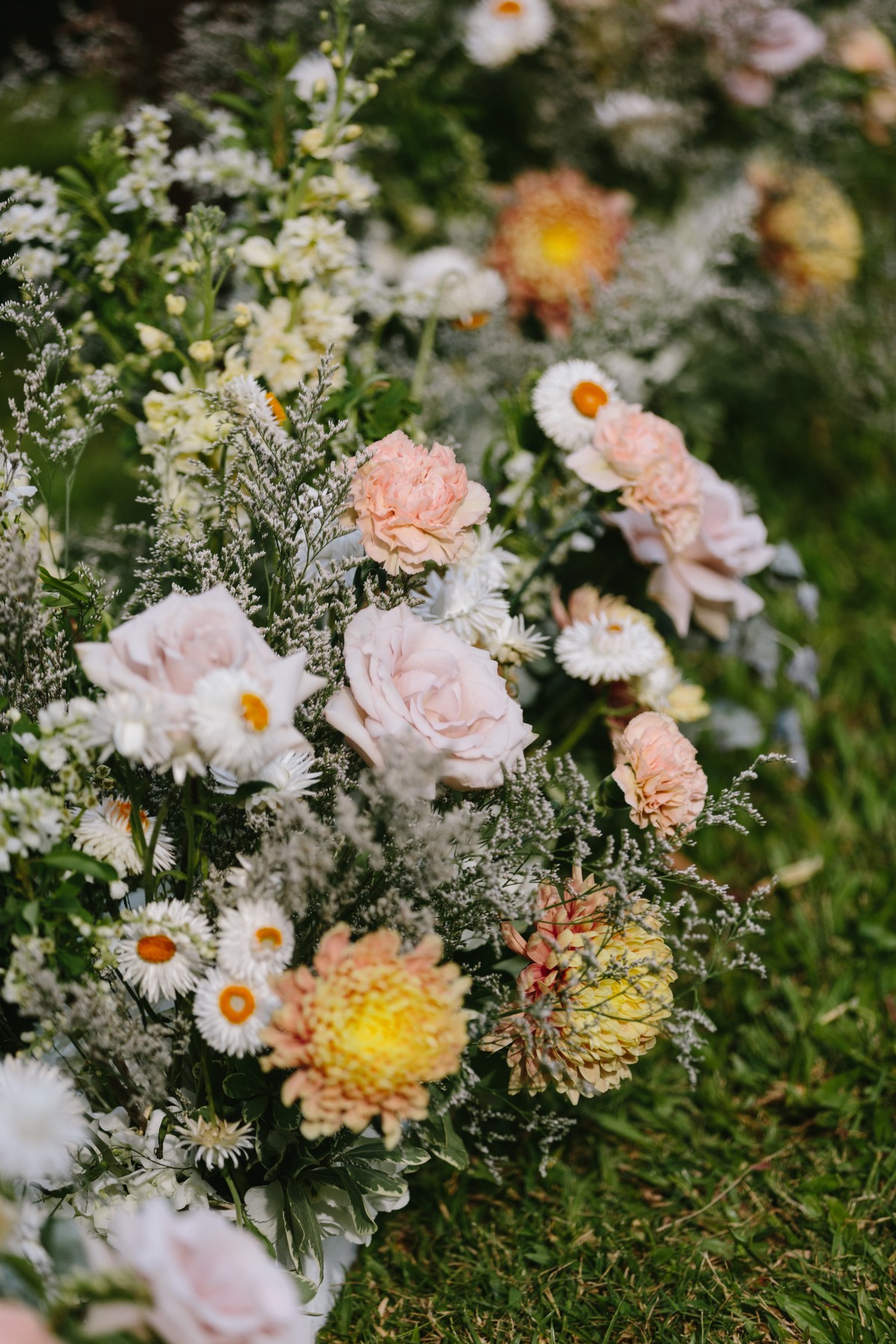 peach pink white and yellow flowers for wedding