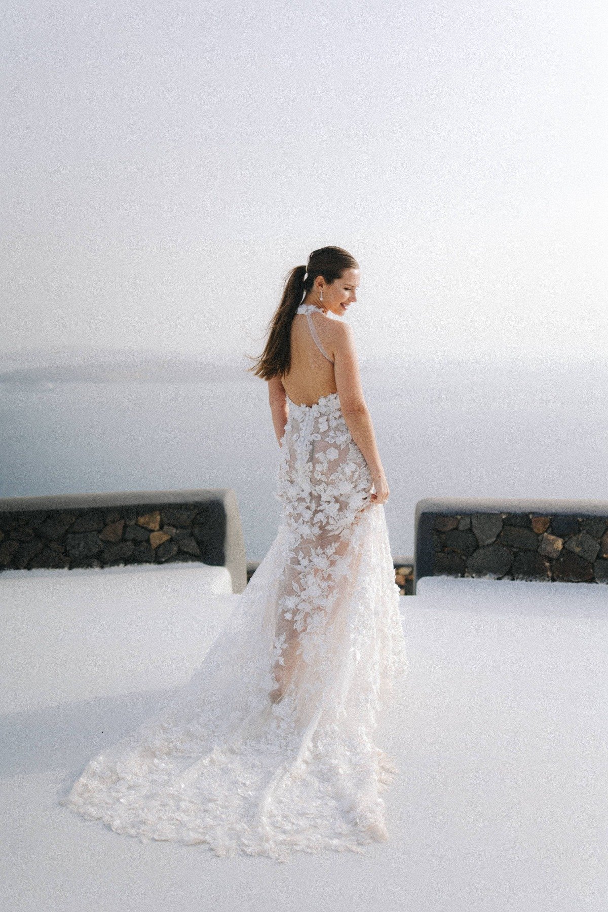 bride in sheer halter wedding gown with 3d flowers