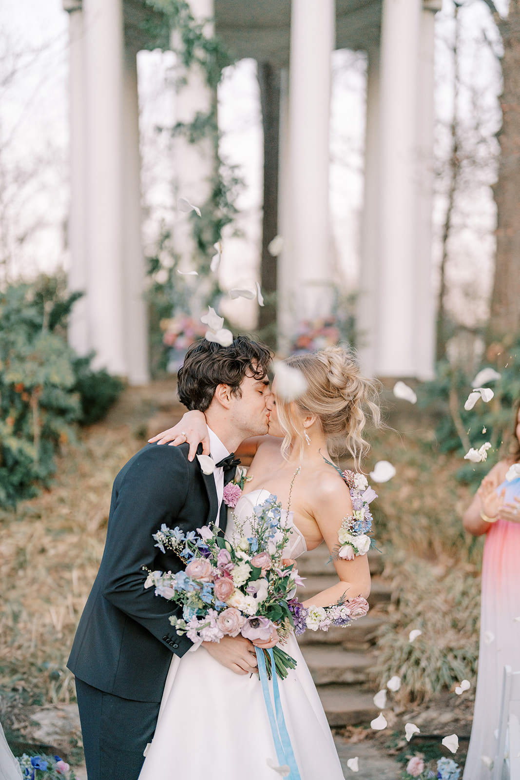 petal toss at pastel colored wedding ceremony