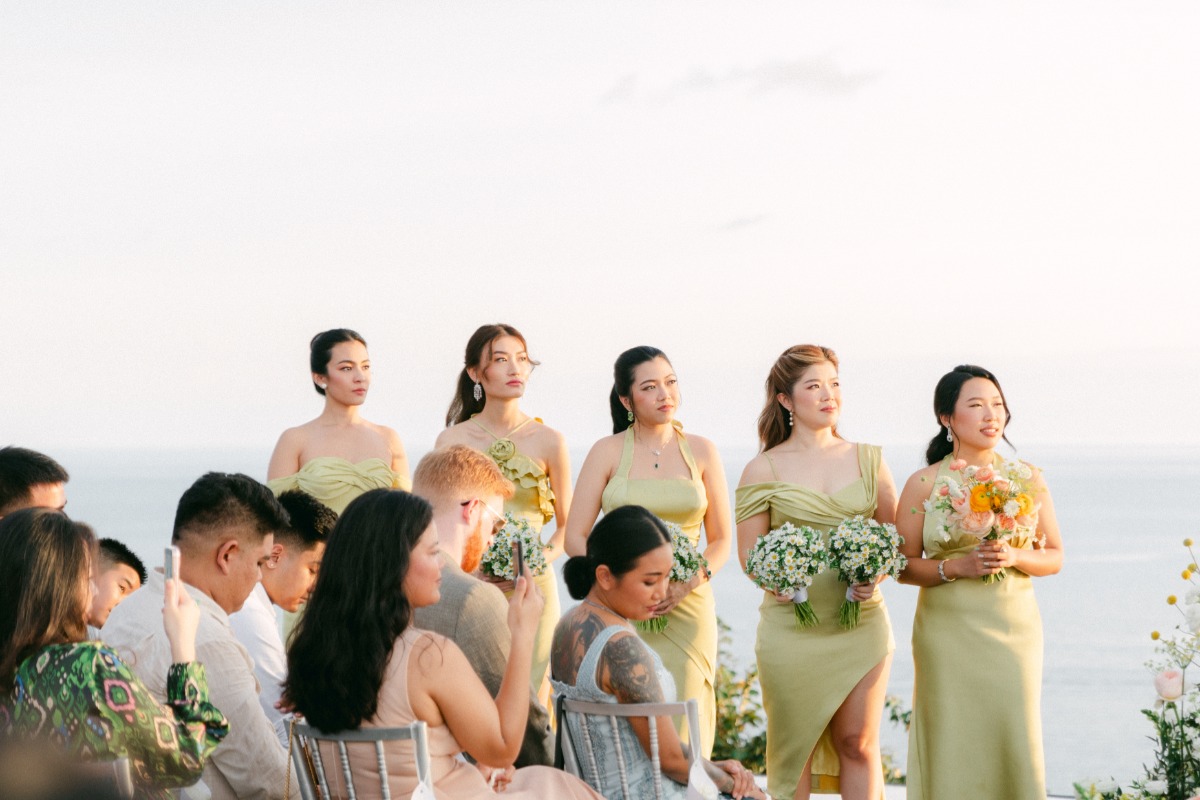 bridesmaids in celery green satin mix and match dresses