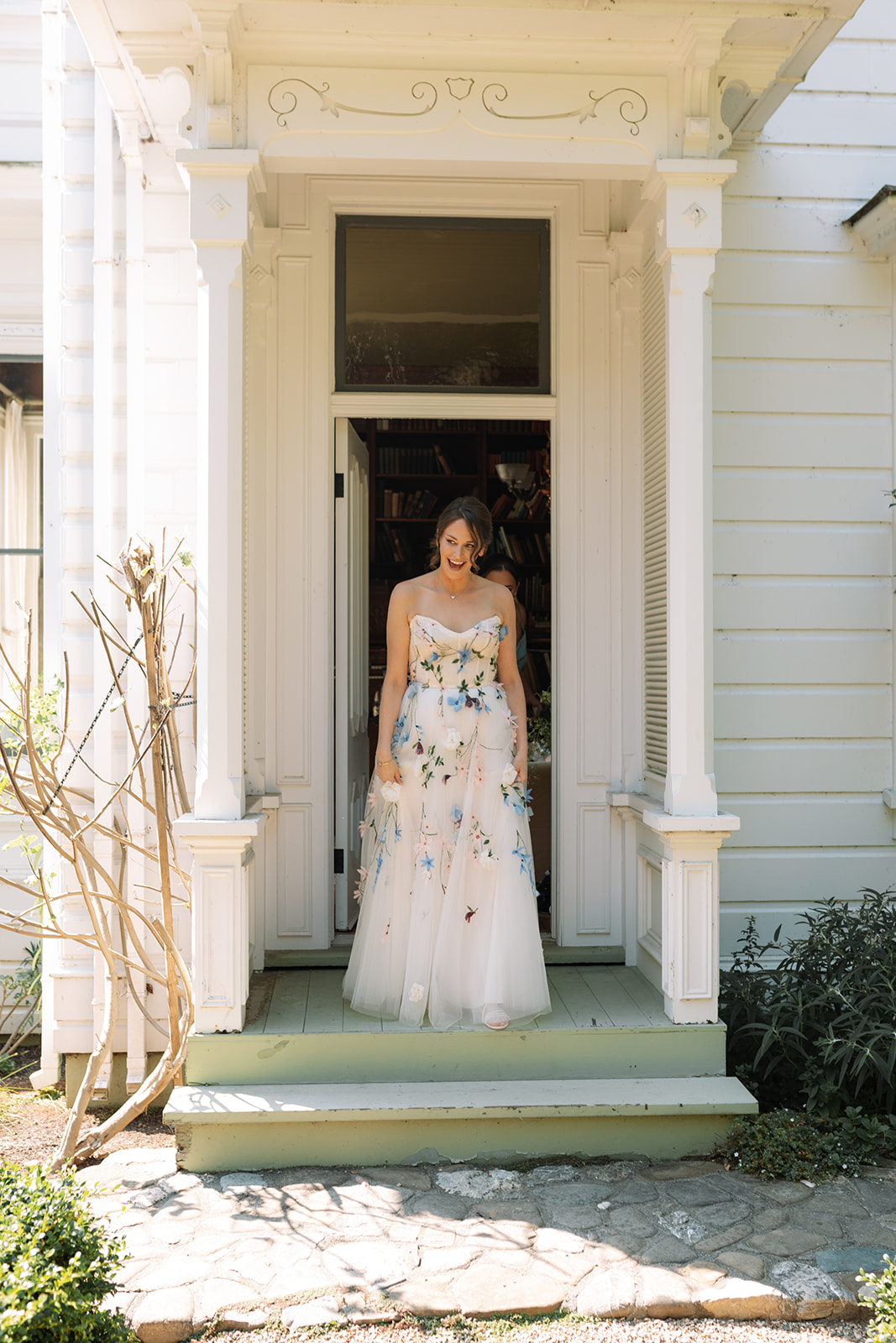 wedding dress with blue and pink flowers