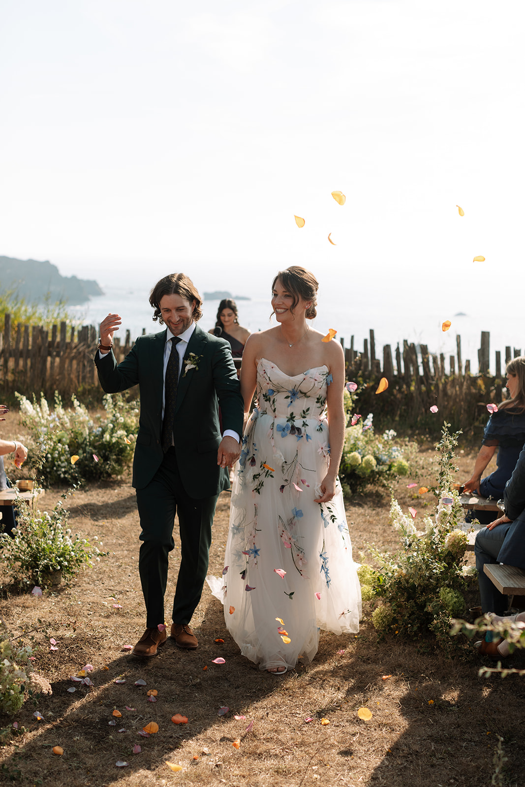 yellow petal toss at california coastal wedding