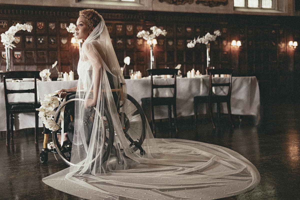 bride in a wheelchair with wedding veil