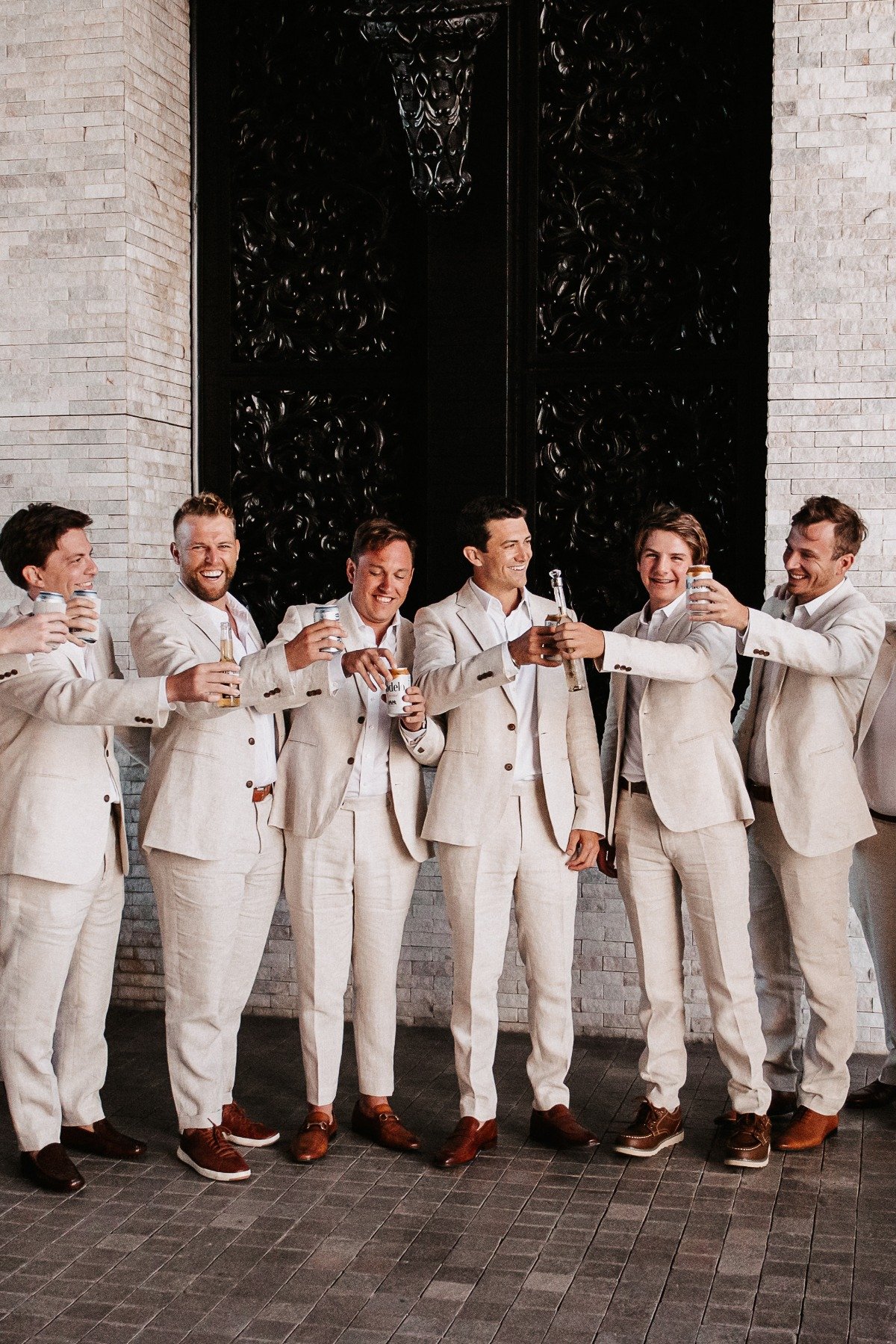 tan linen groom and groomsmen suits