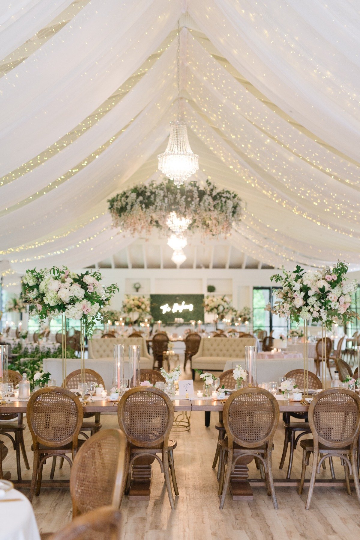 white and pink french themed tented wedding reception