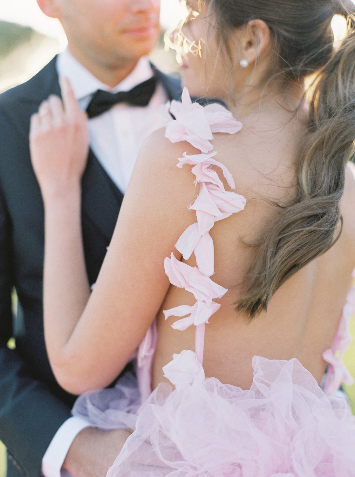 pink wedding dress with a ponytail