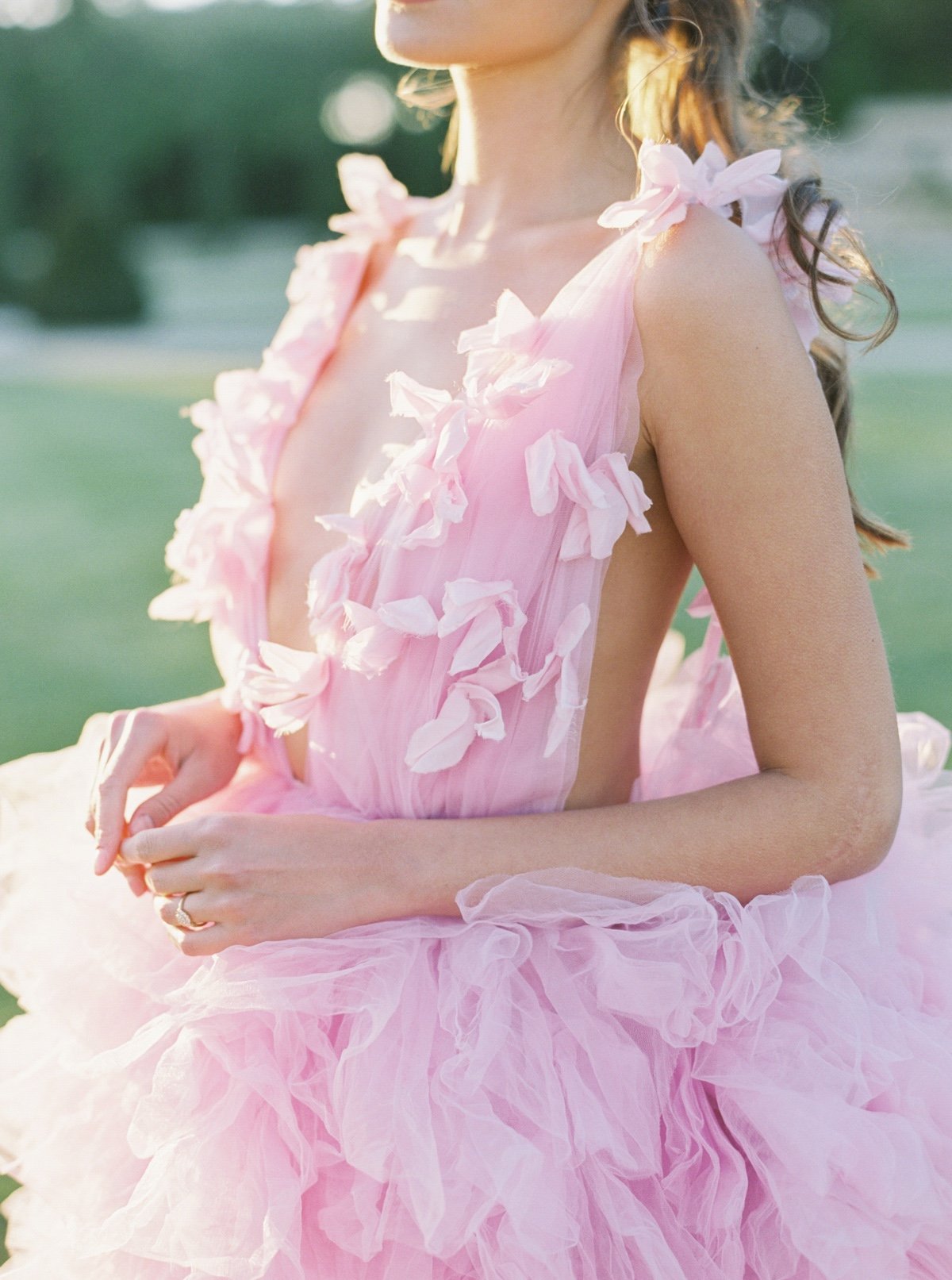 pink wedding gown with plunging neckline and 3d flowers