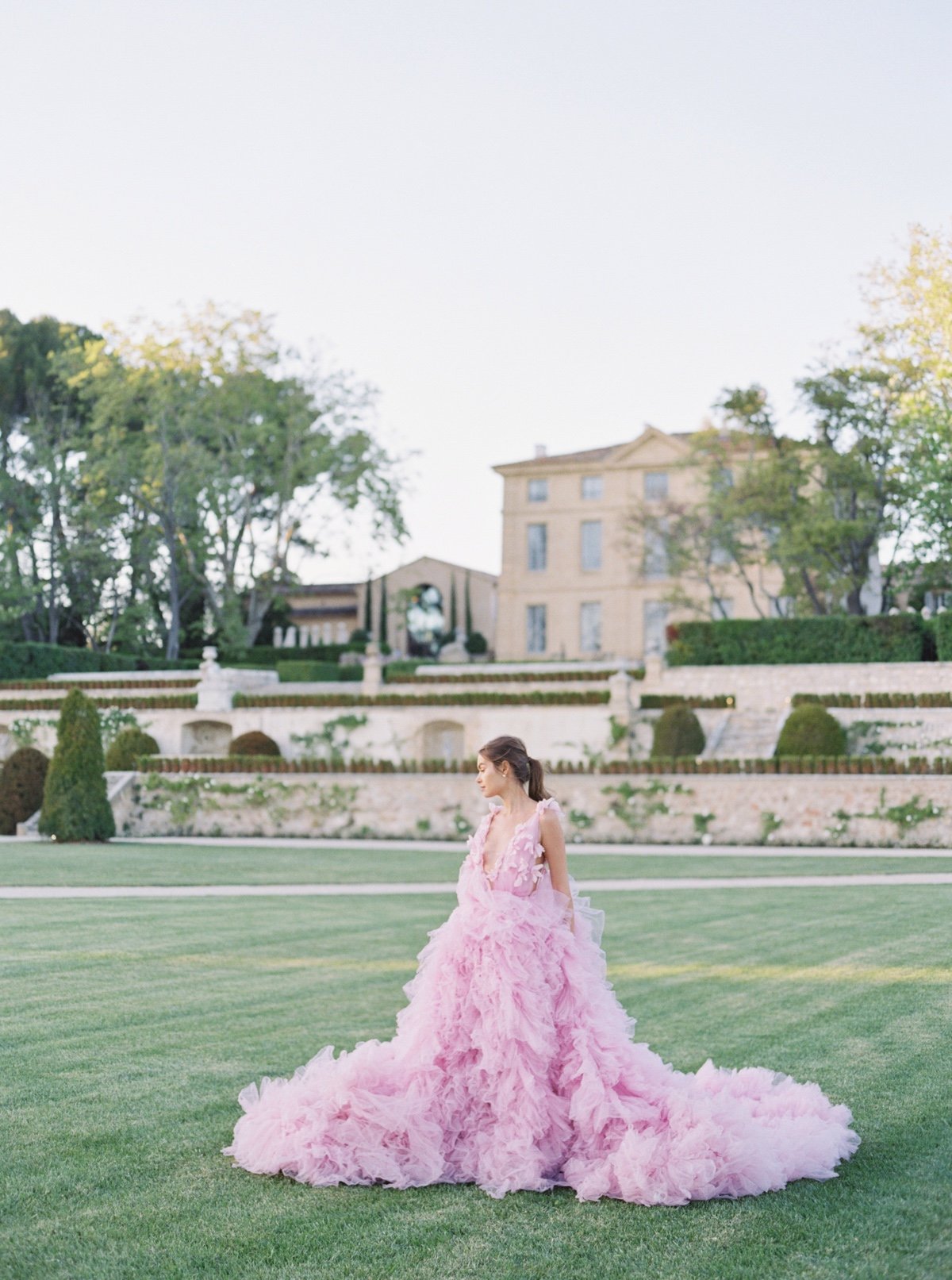 chateau wedding in france with a pink wedding gown