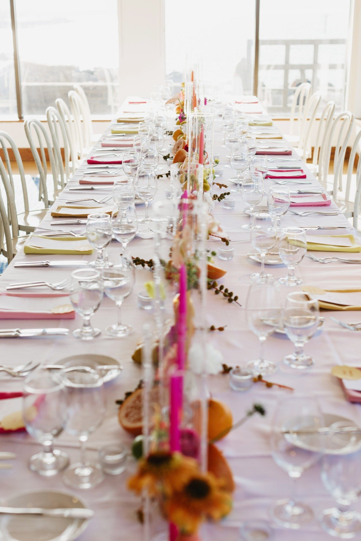 bright citrus rainbow themed wedding reception