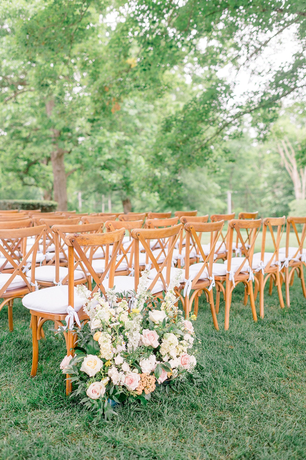 peach and blush wedding floral arrangement