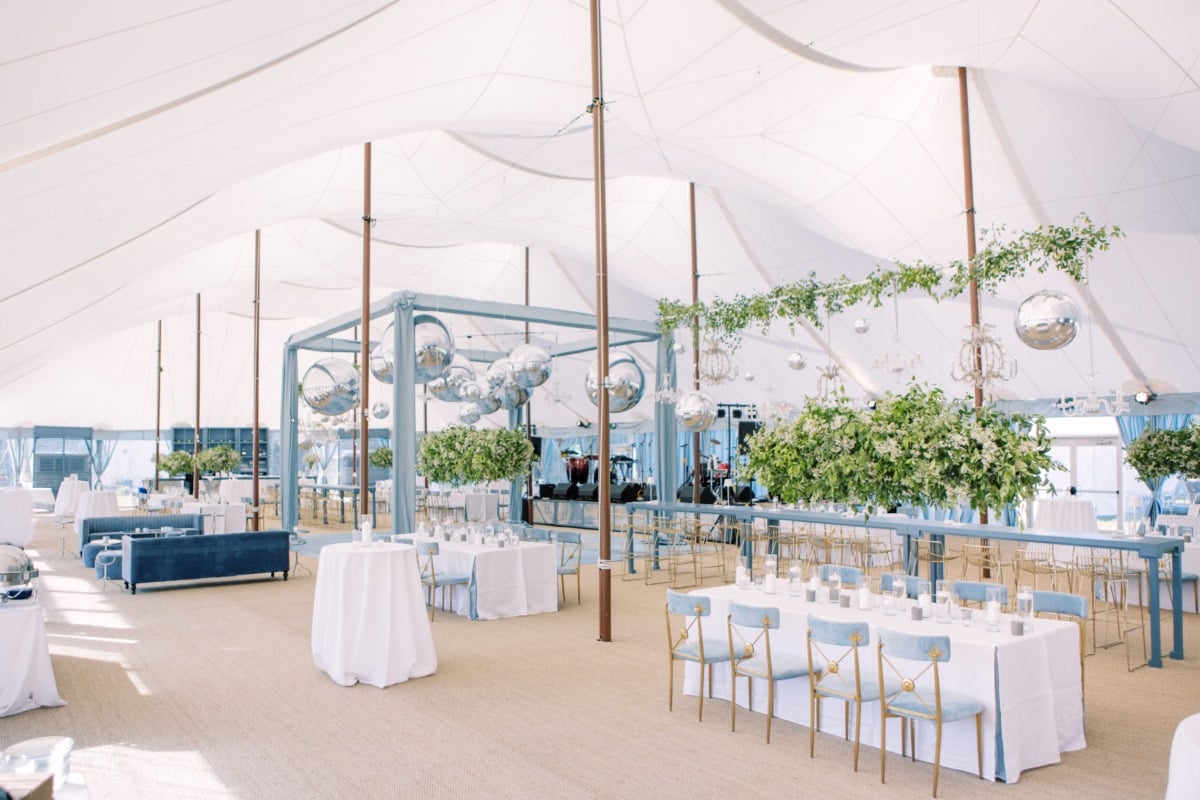 blue white and gold tented wedding reception