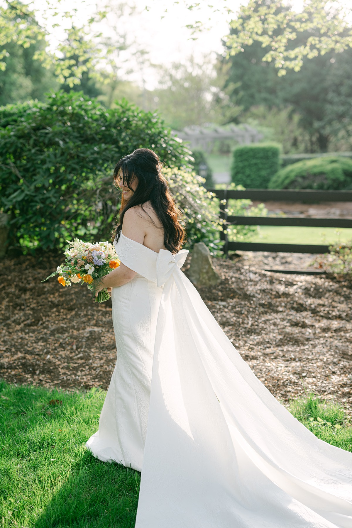 wedding gown with bow cape back