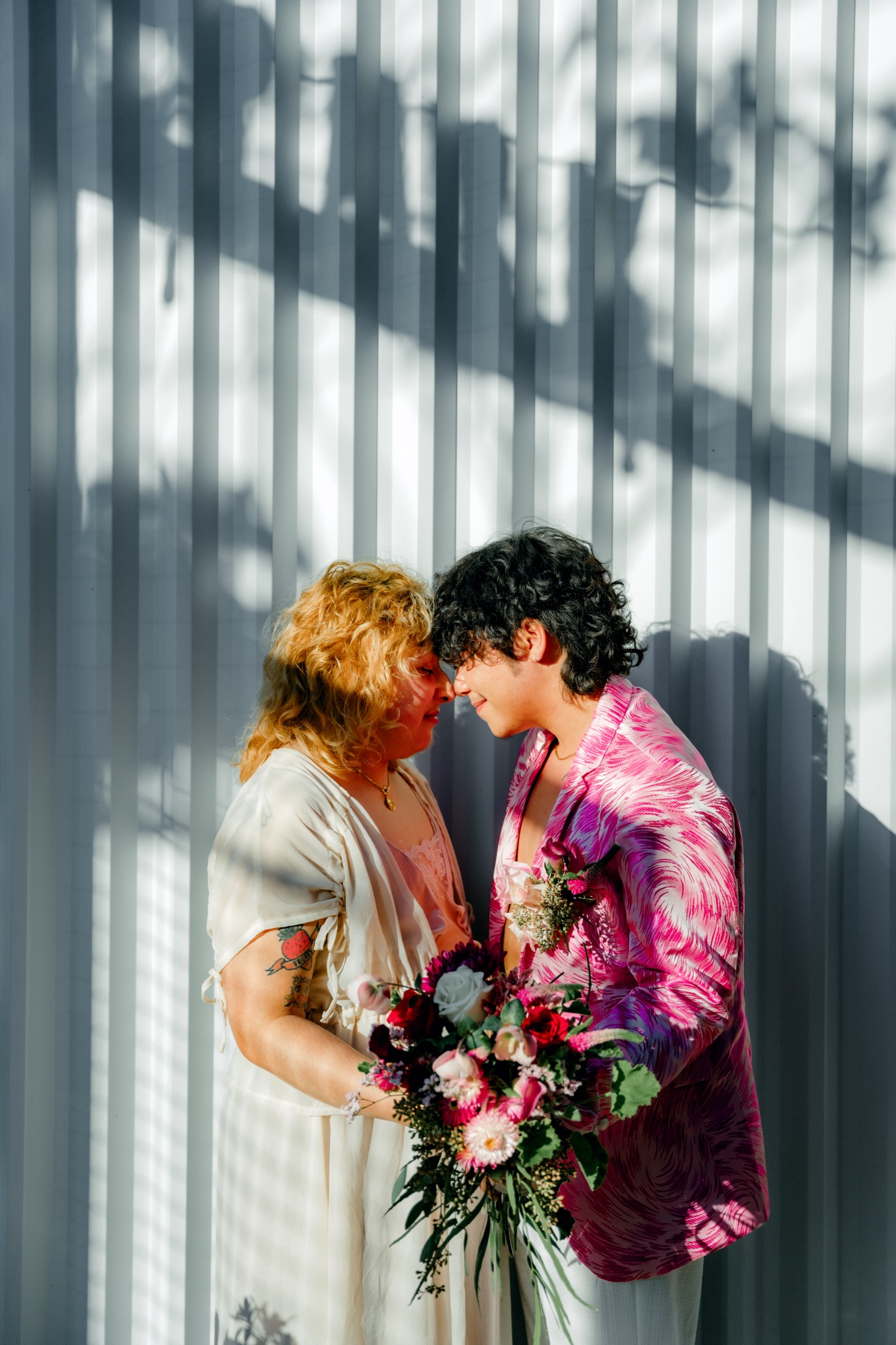 LGBTQIA micro wedding ideas with colorful indie fashion