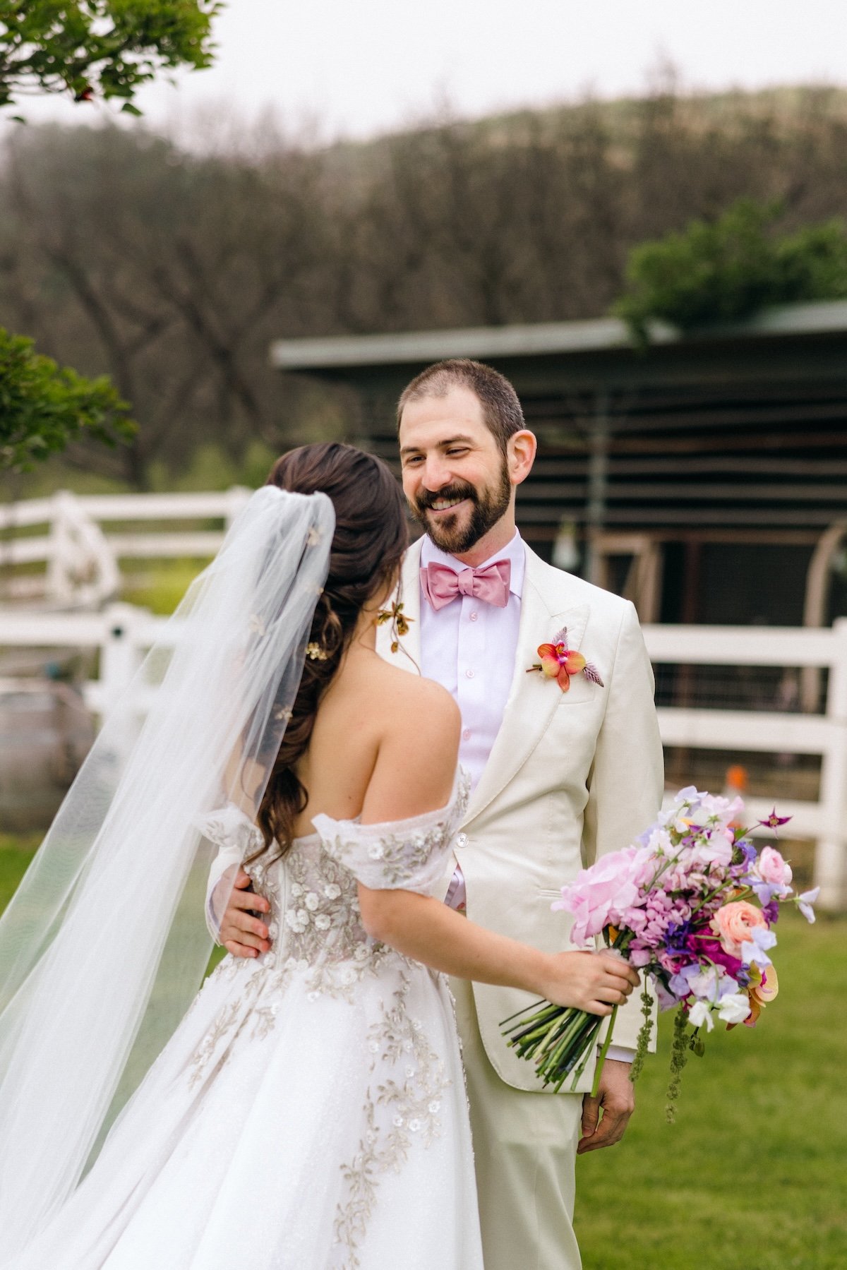 bride with wide braid and gold barettes