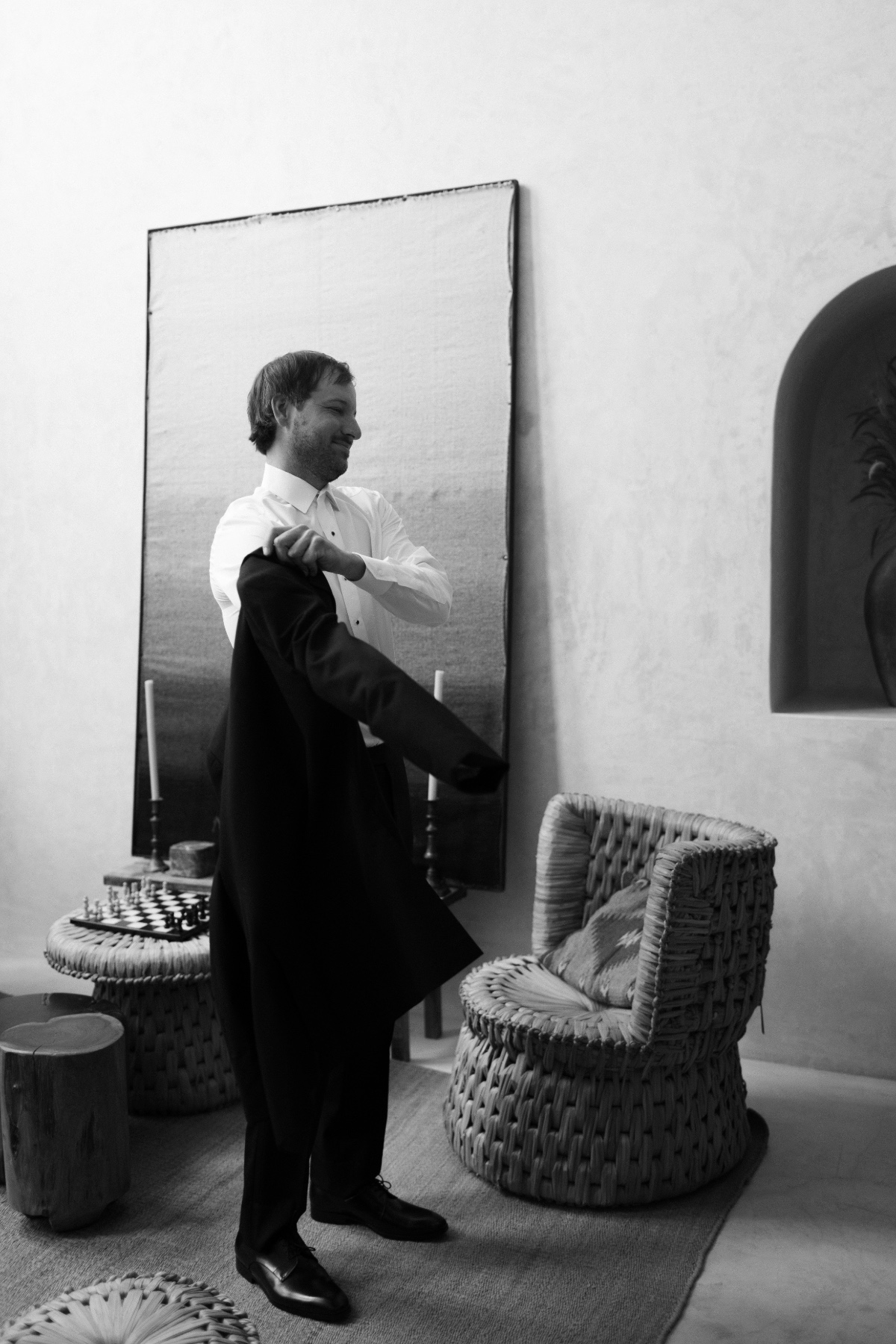 groom getting ready in suite in mexico