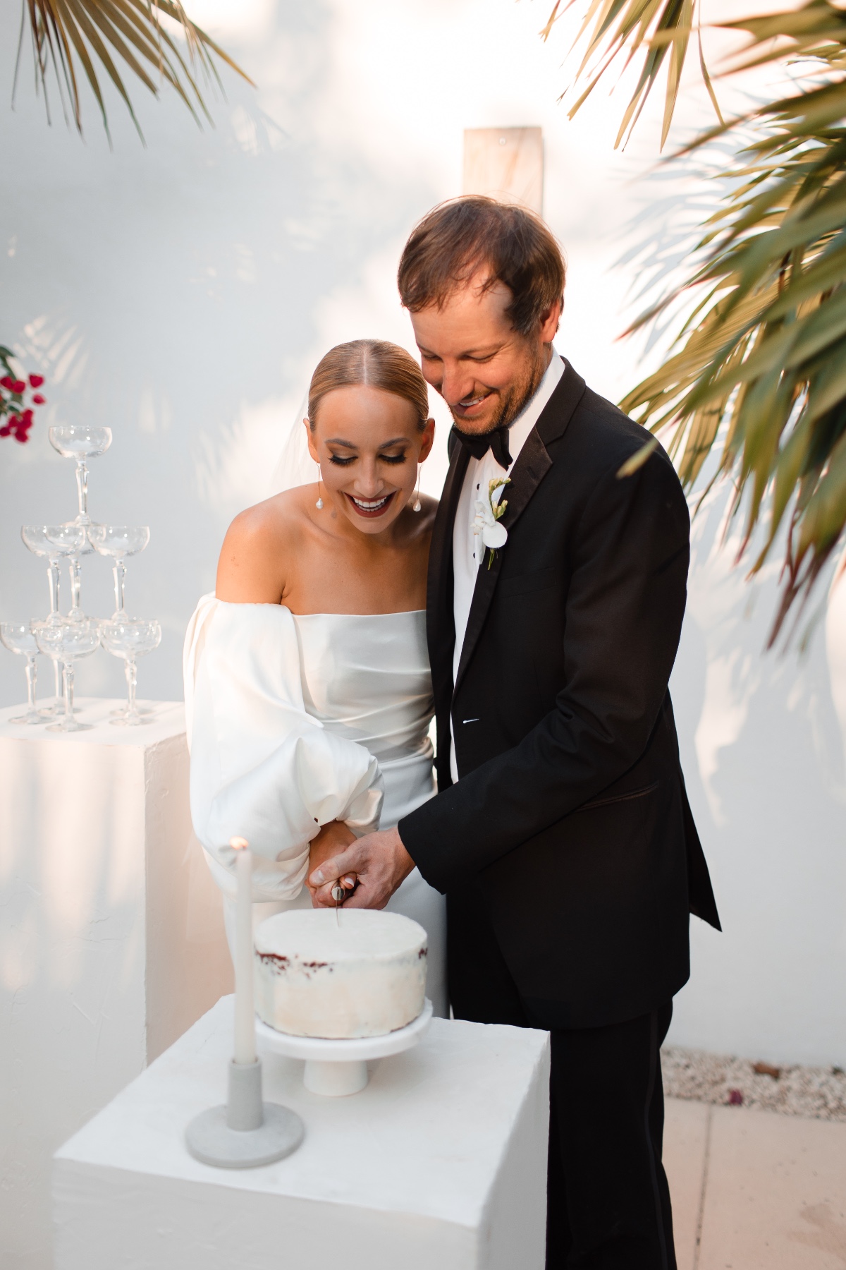 bride and groom cutting cake at elopement