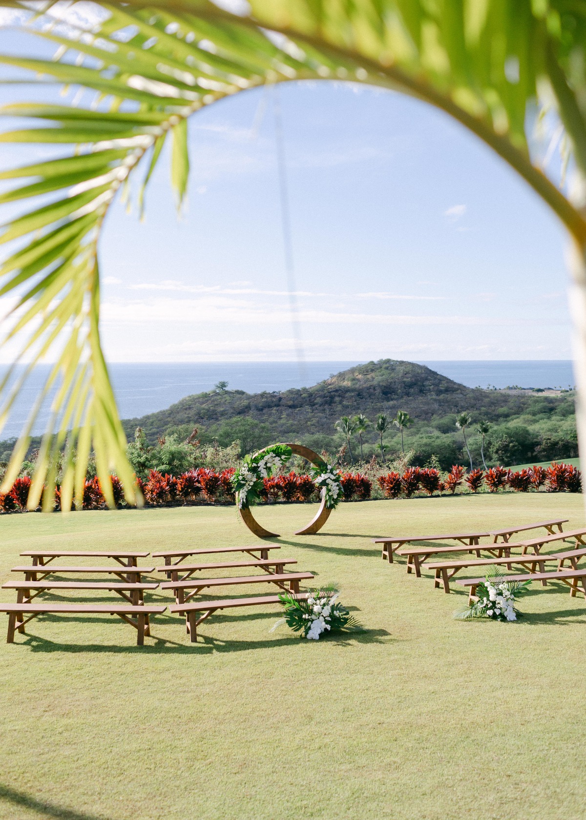 tropical wedding in hawaii with ocean backdrop