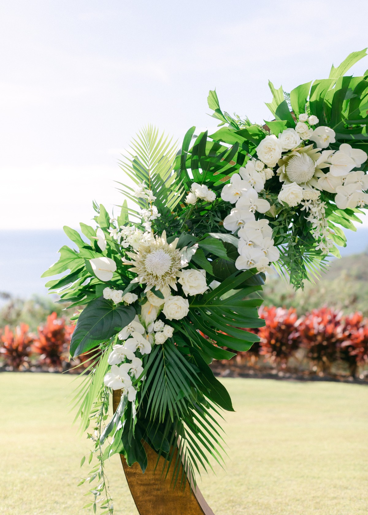 white tropical wedding flower ceremony decorations