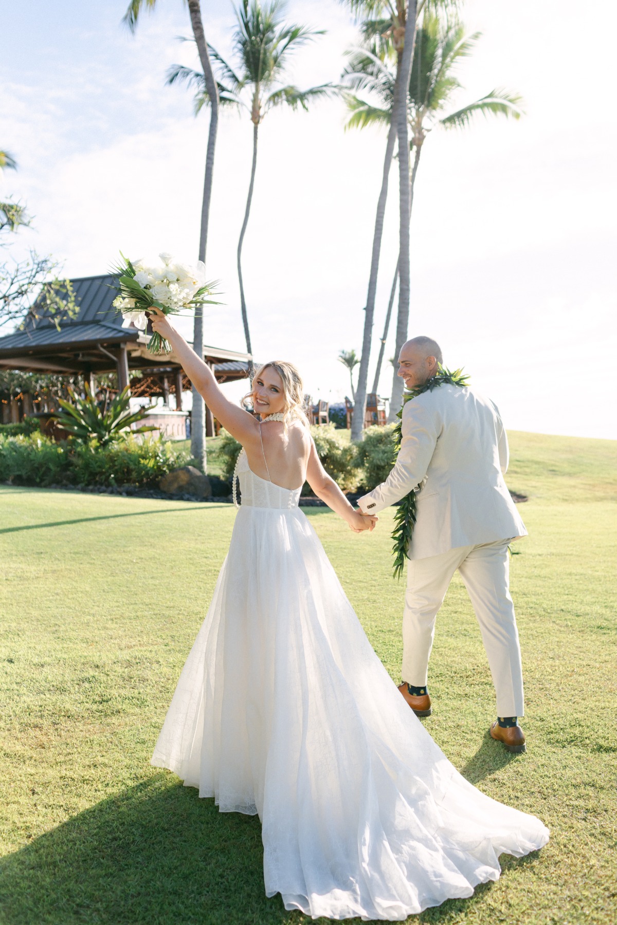 bride and groom at tropical wedding in hawaii