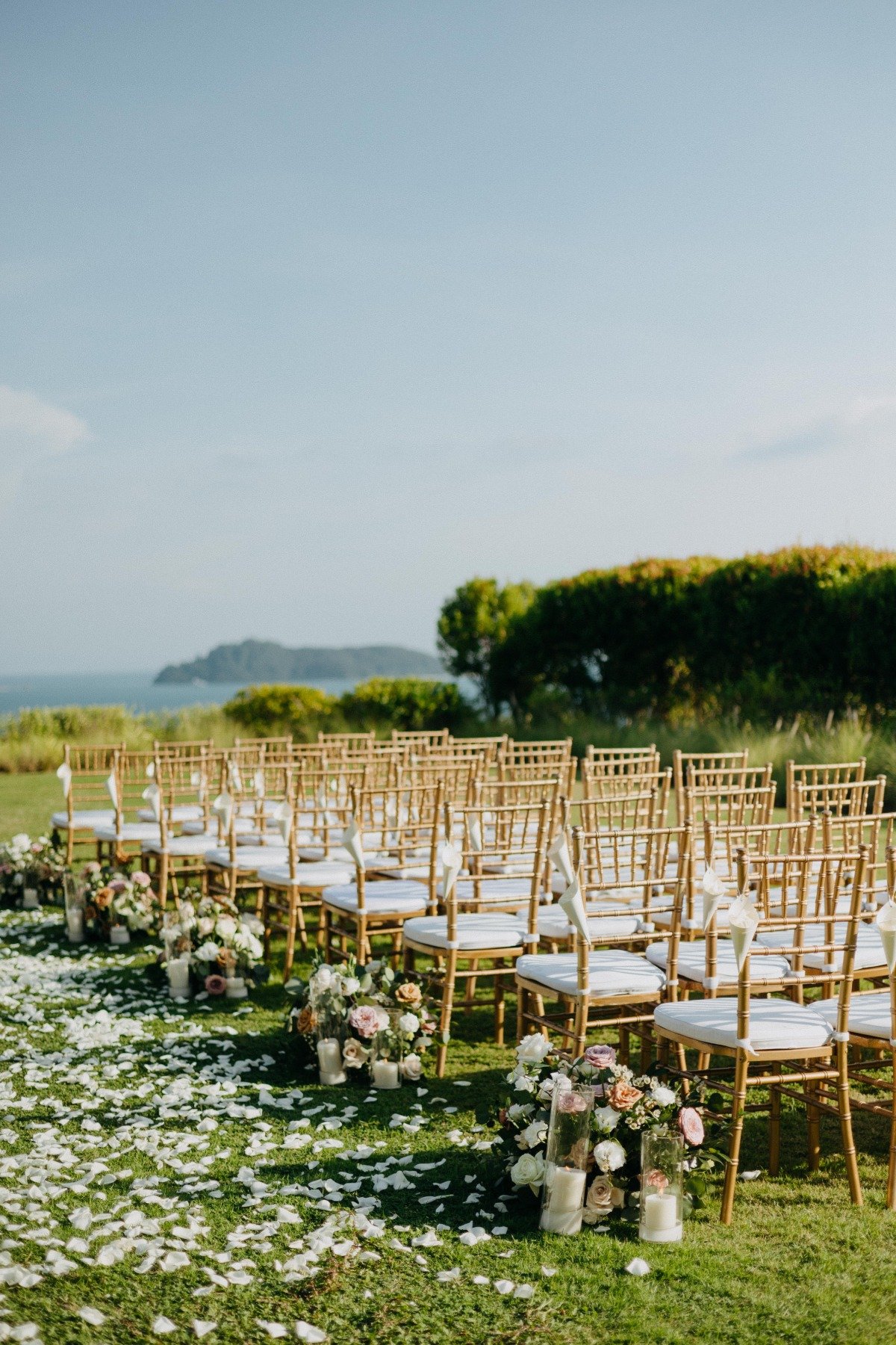 white and gold ceremony chairs