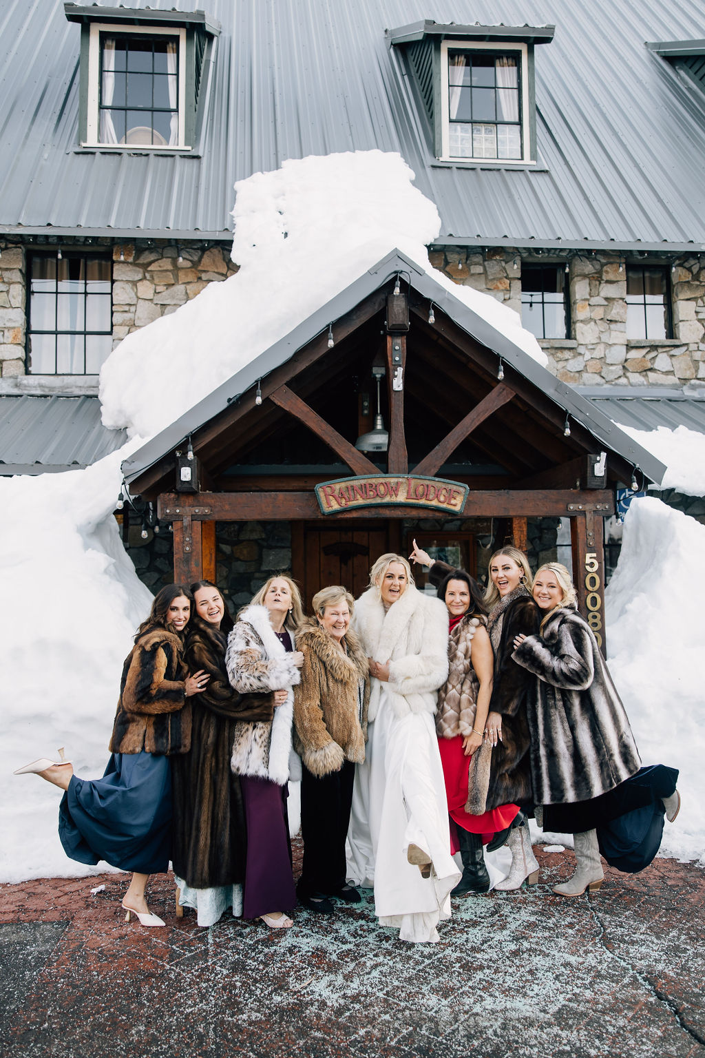 bridesmaids in fur coats for wedding