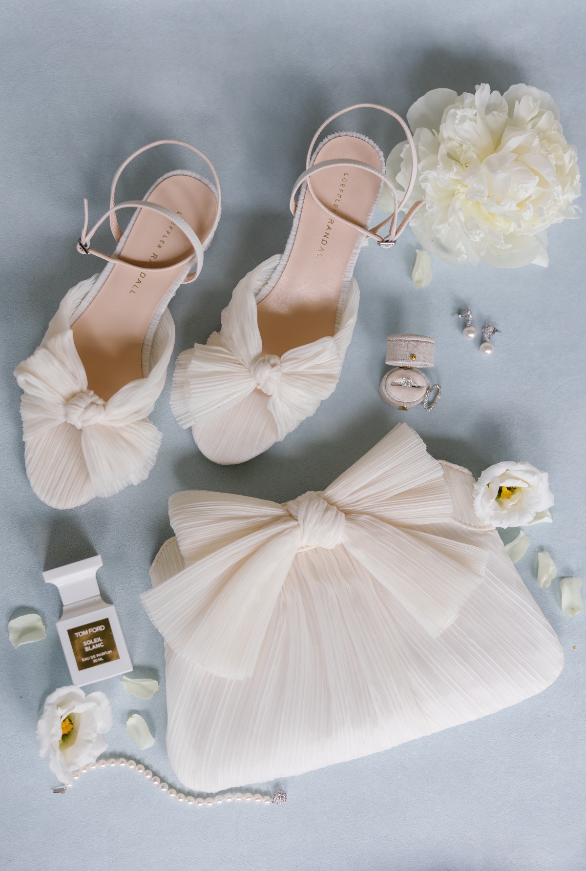 matching ivory bridal shoes and clutch with pearl earrings