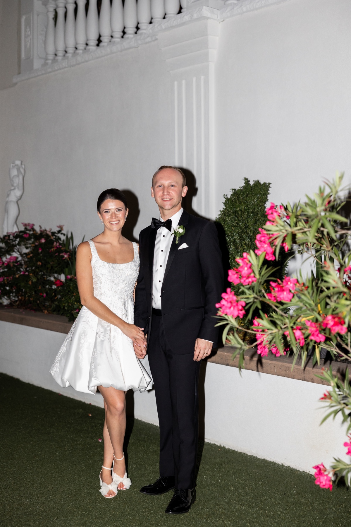 bride in cute mini dress for reception