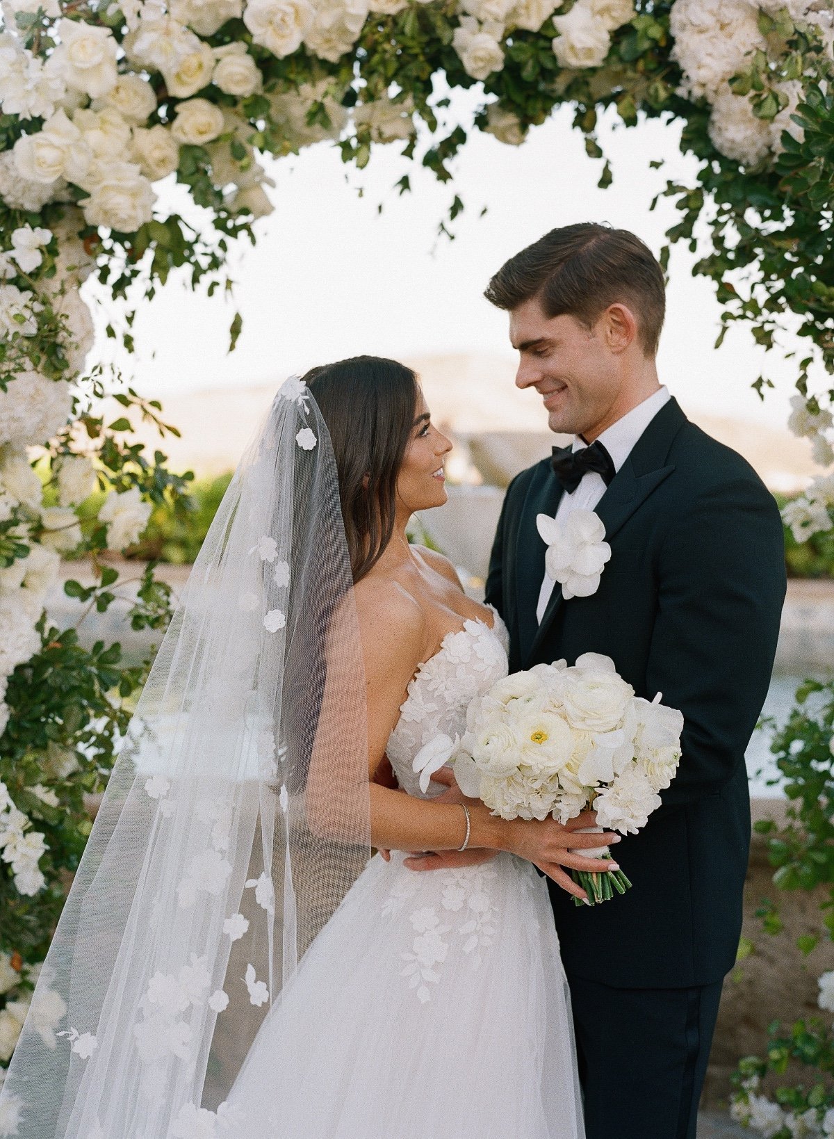 wedding arch with white roses