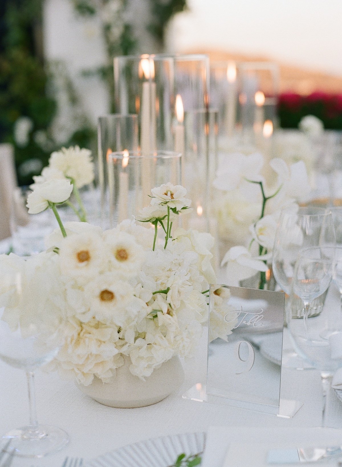 short white wedding reception flower arrangements