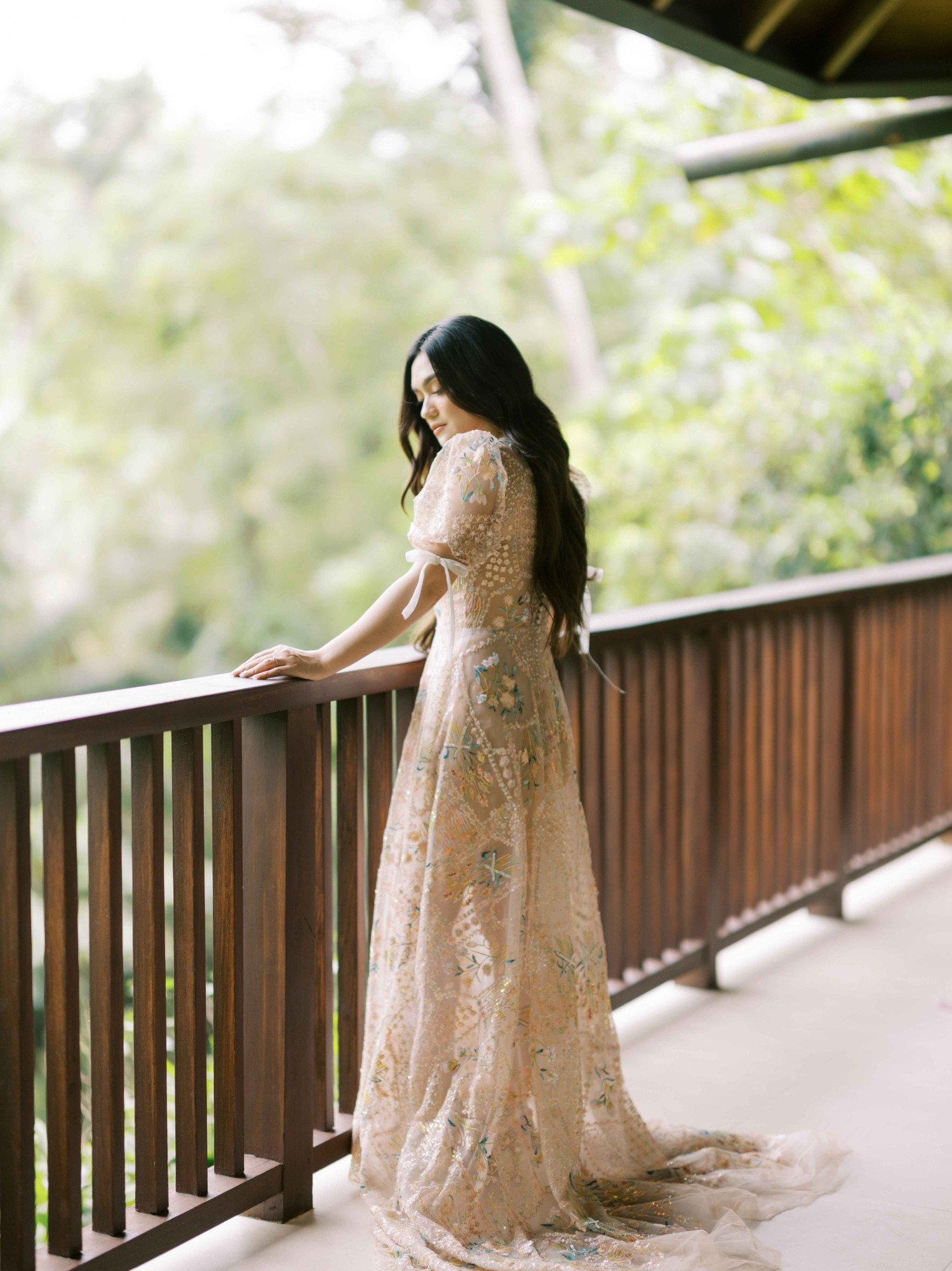 nude wedding gown with pastel embroidery