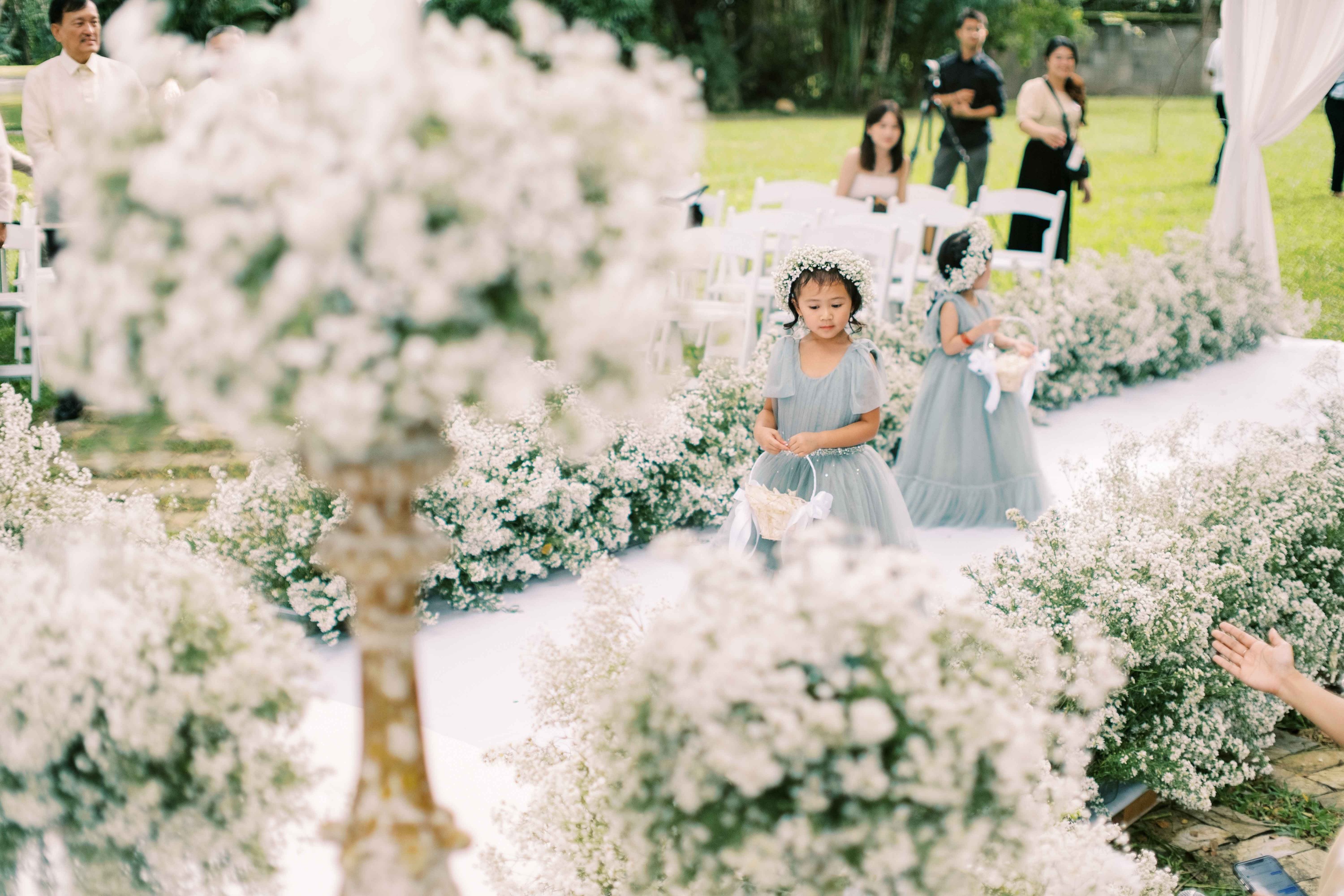 flower girls in dusty blue tulle dresses