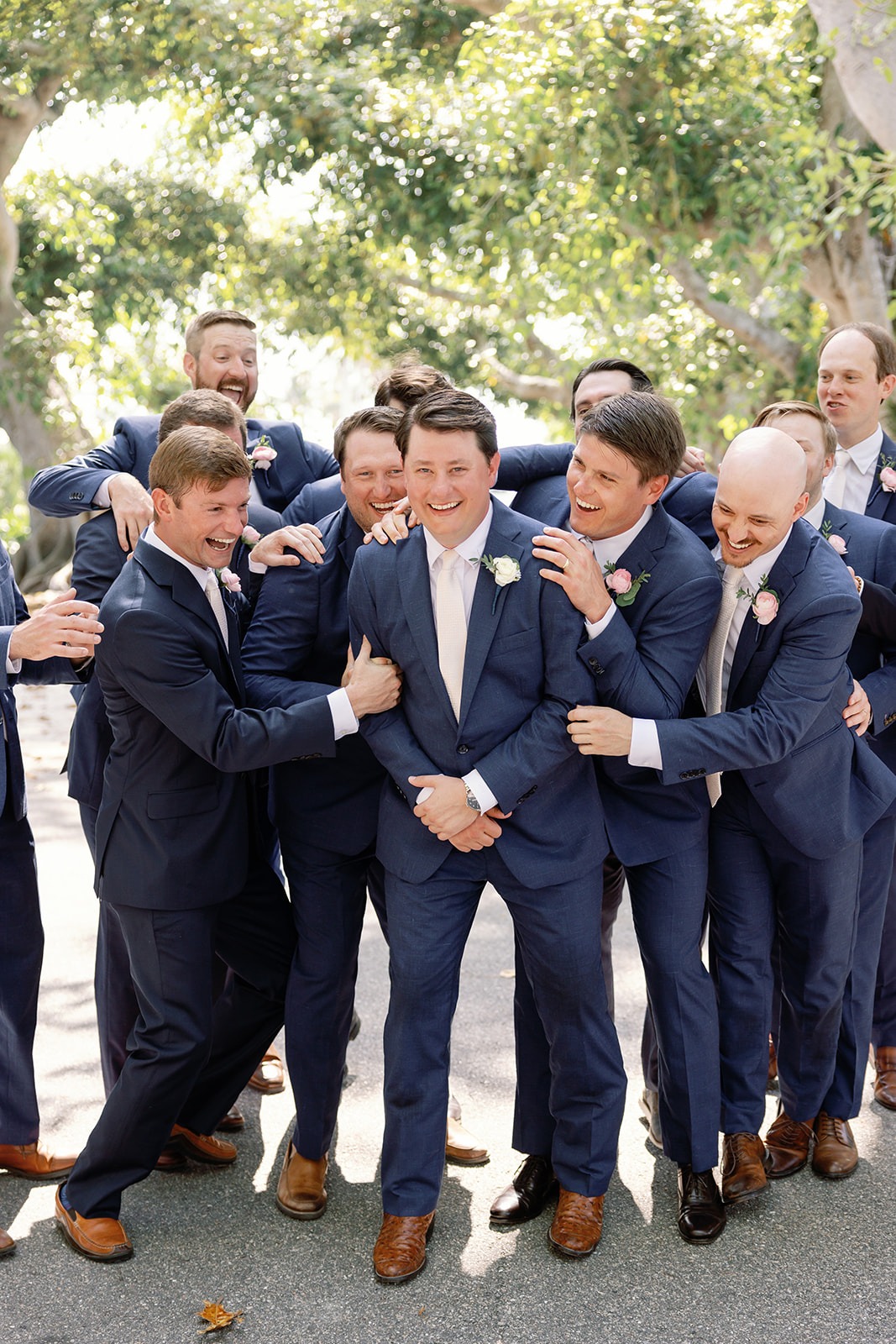 groomsmen in blue suits