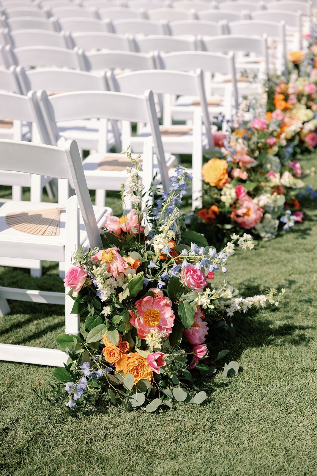 colorful floor flower arrangements for outdoor wedding