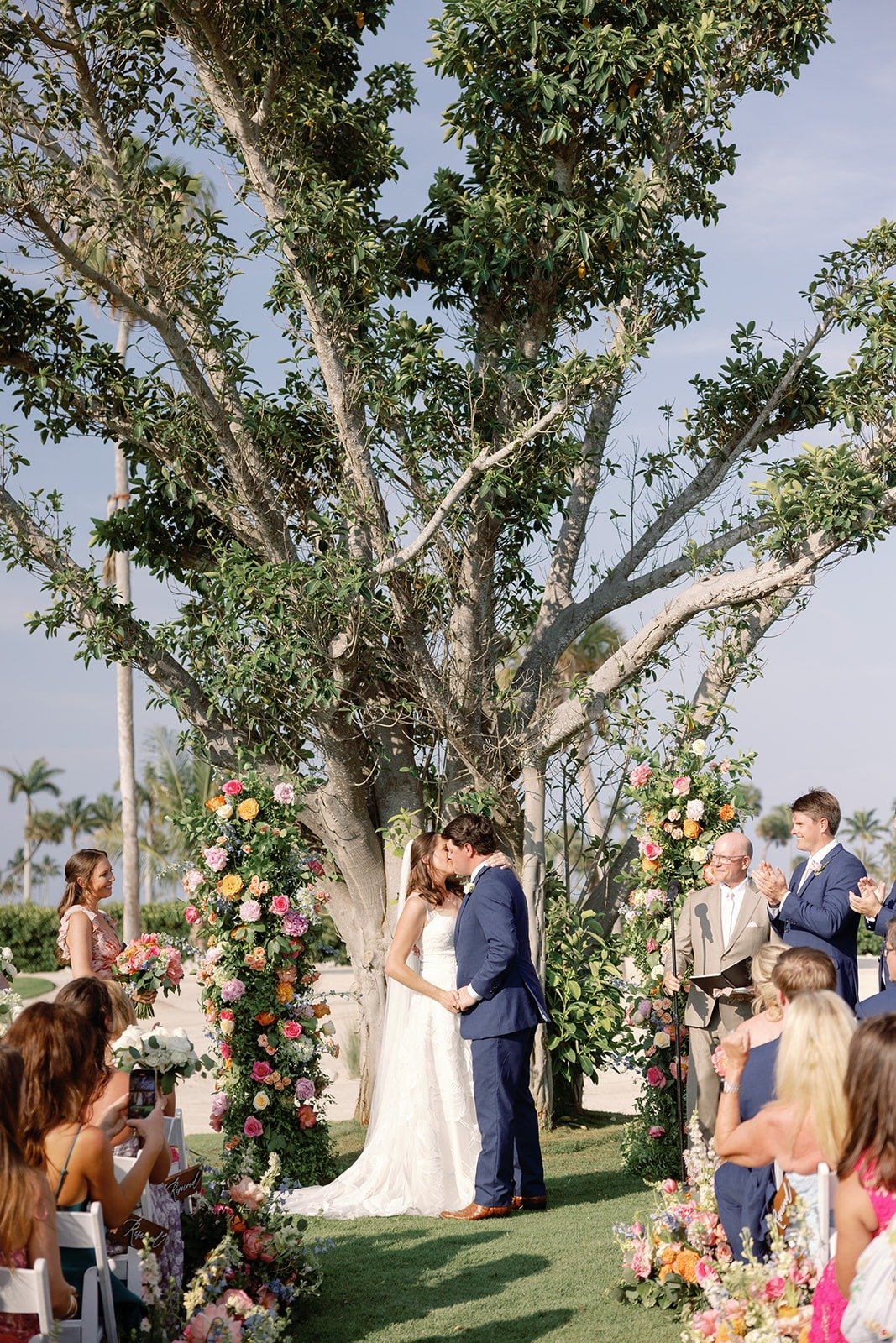 colorful floral arch for garden wedding