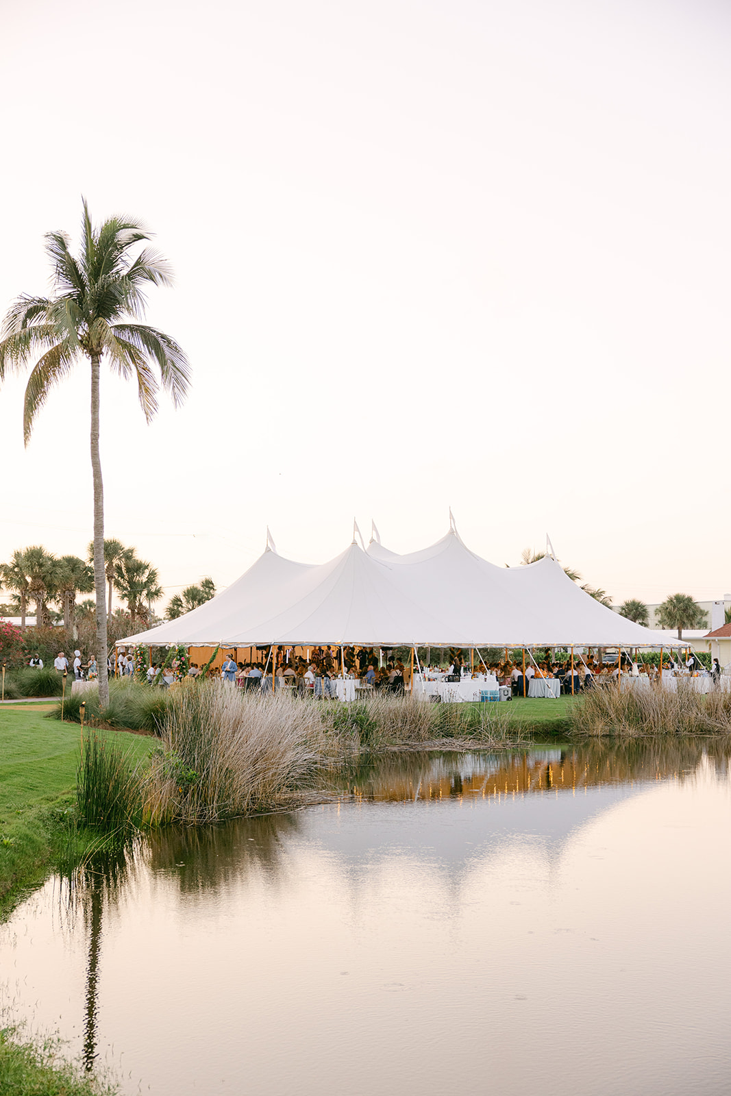 tented wedding reception on a lake in florida