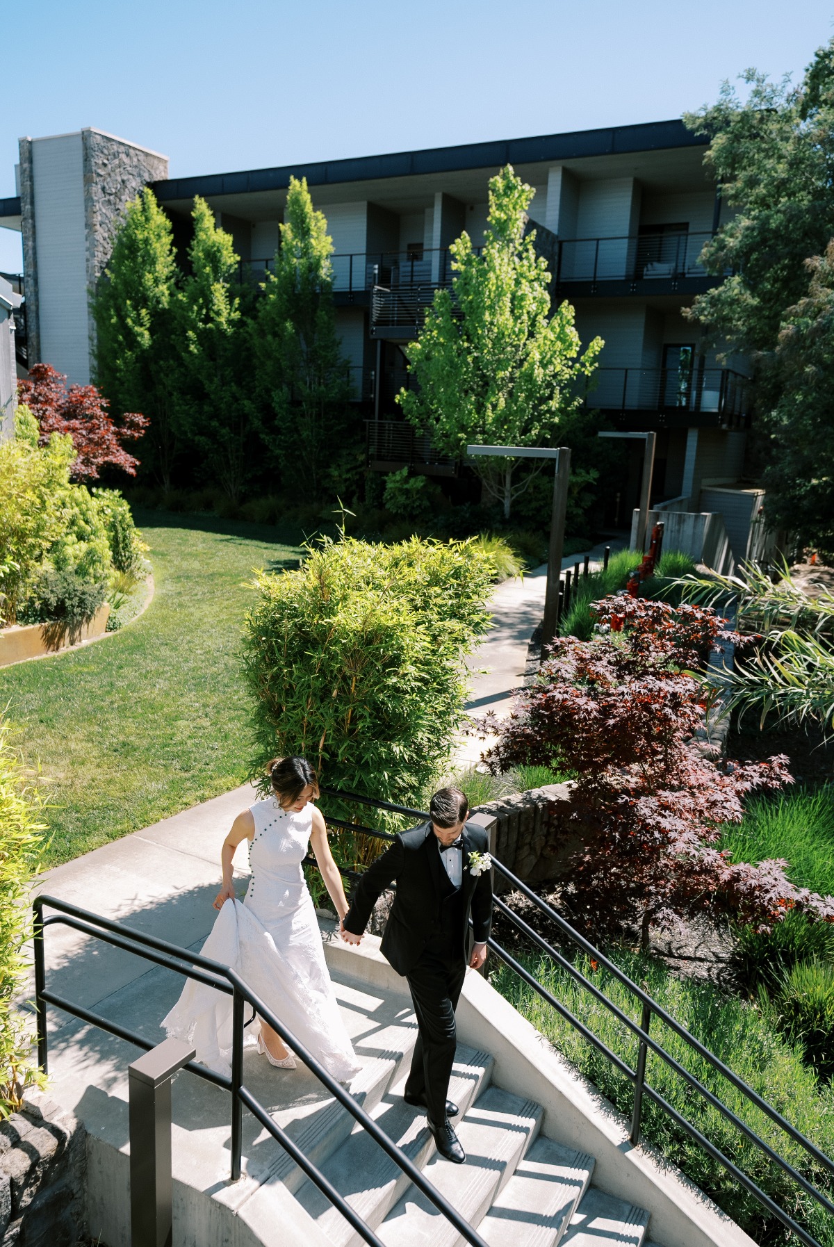 bride and groom walking to chinese tea ceremony in napa valley hotel