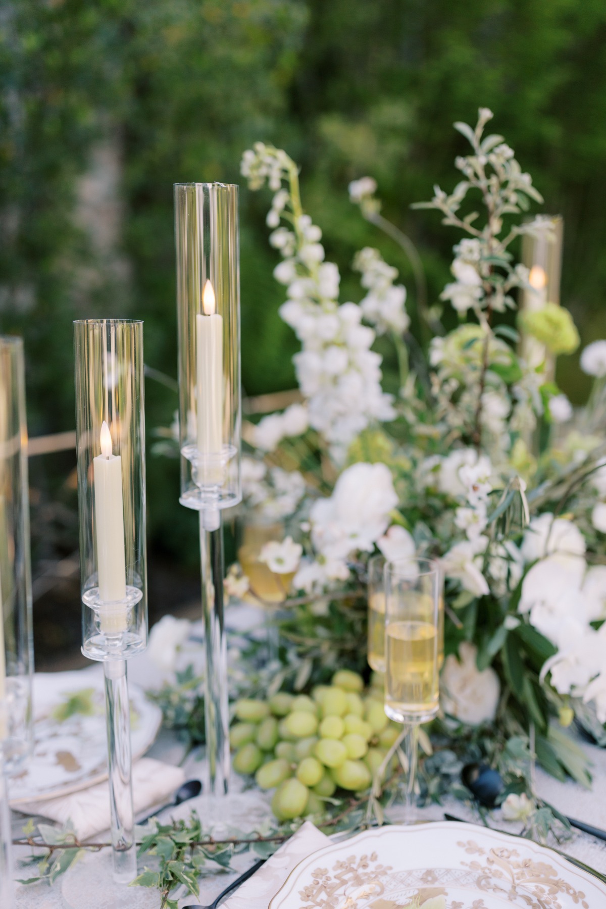 tall hurricane vases for taper candles and champagne flutes