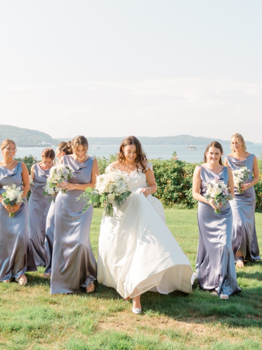 Coastal maine wedding in shades of blue with a speakeasy bar tent