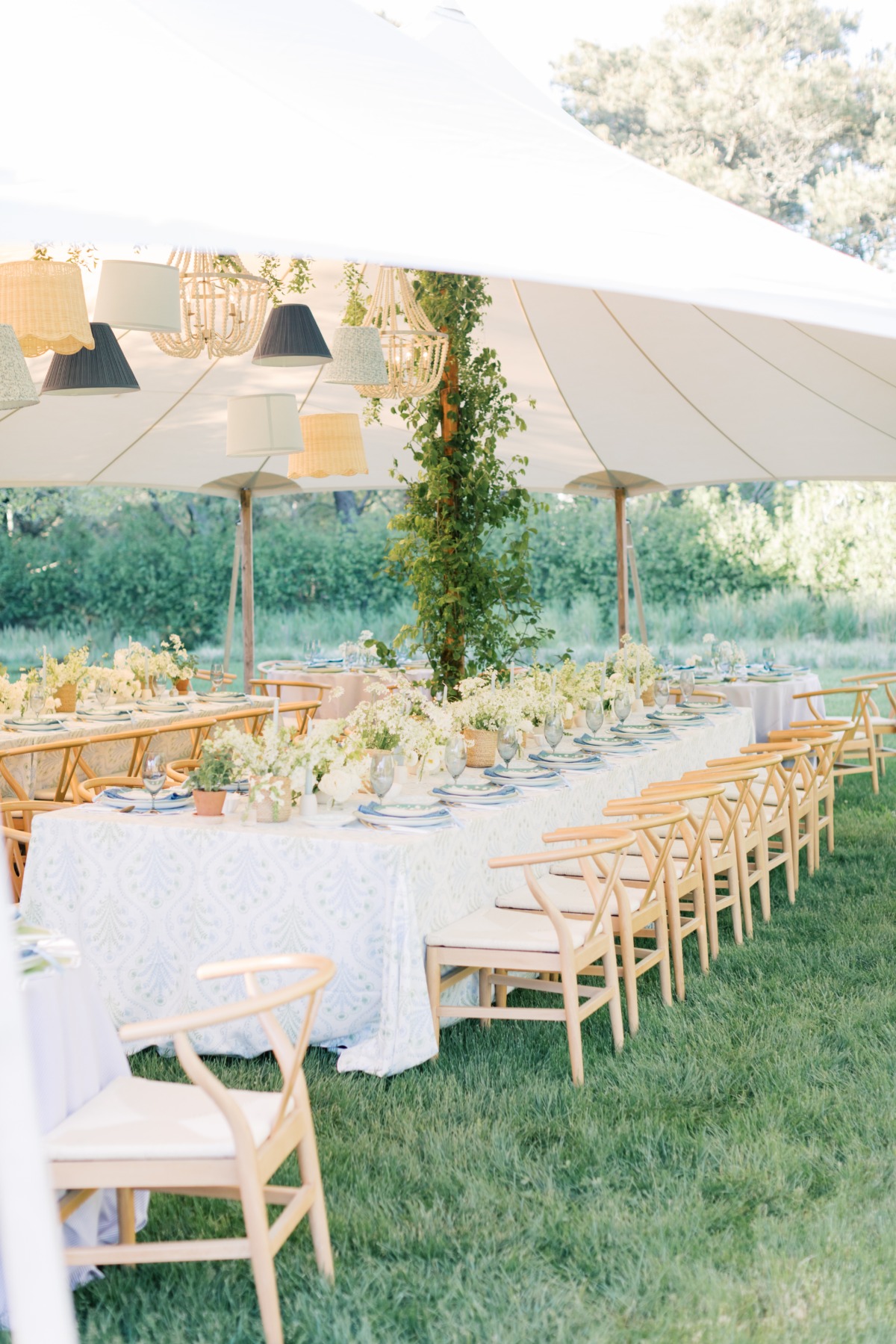 sailcloth tent reception with hanging lampshades