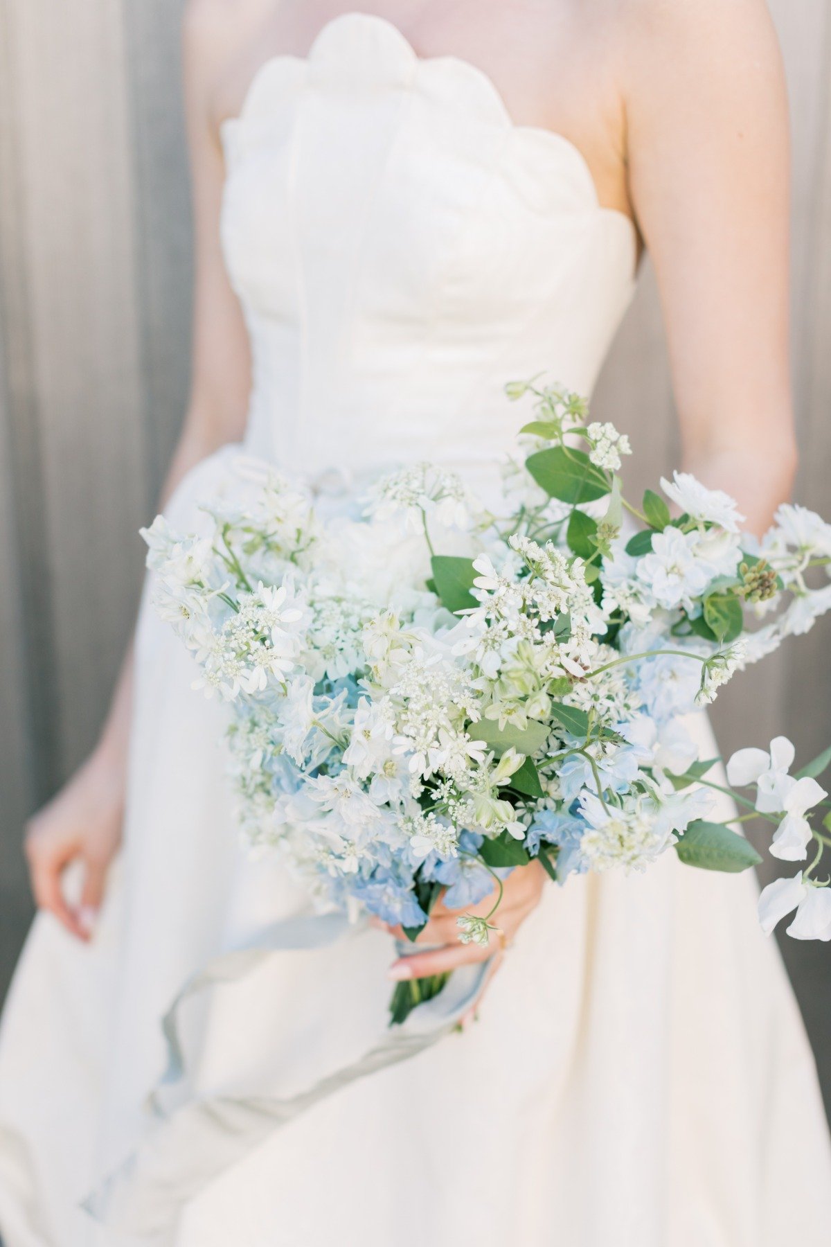 blue and white bouquet with blue silk ribbon