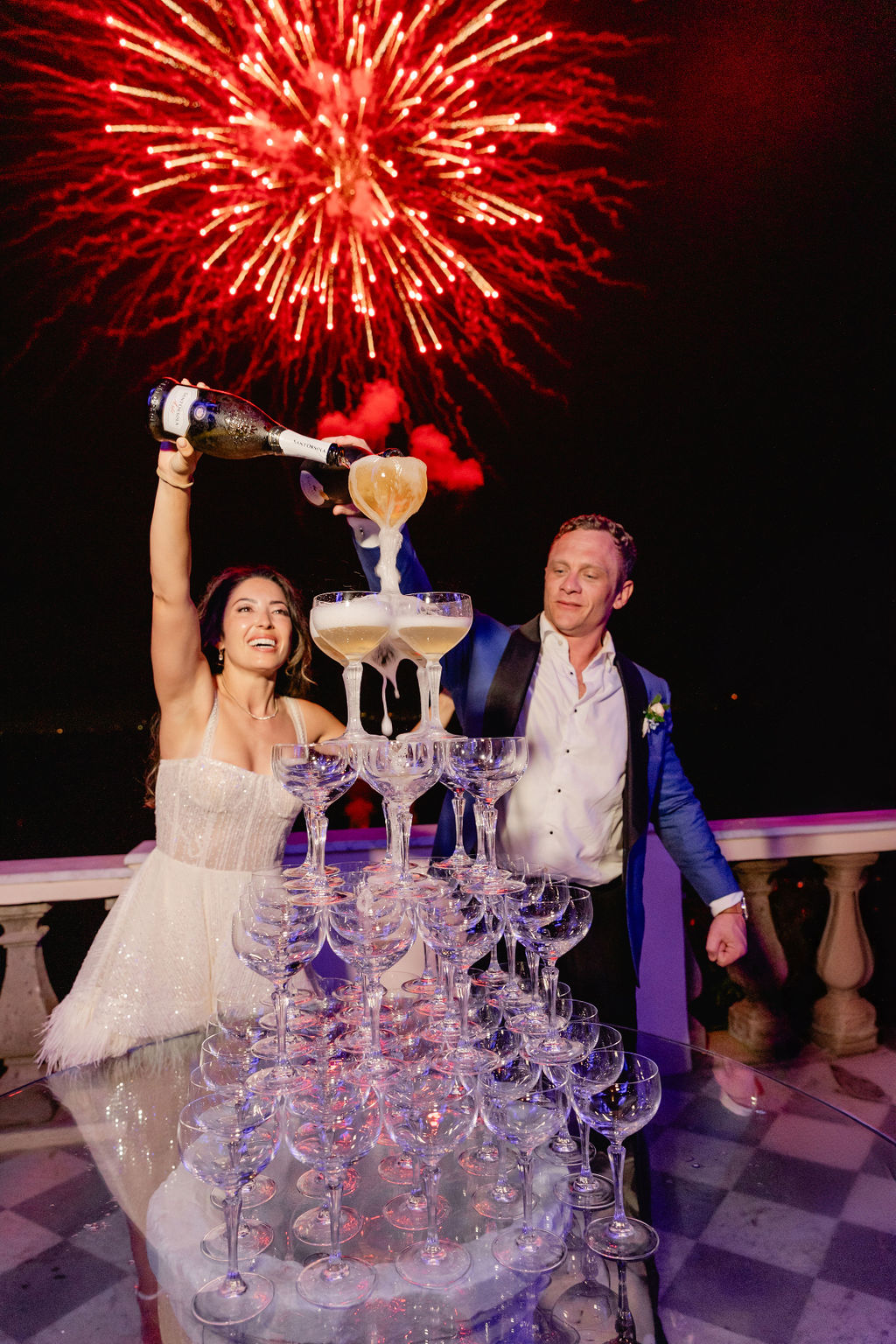 champagne tower with fireworks