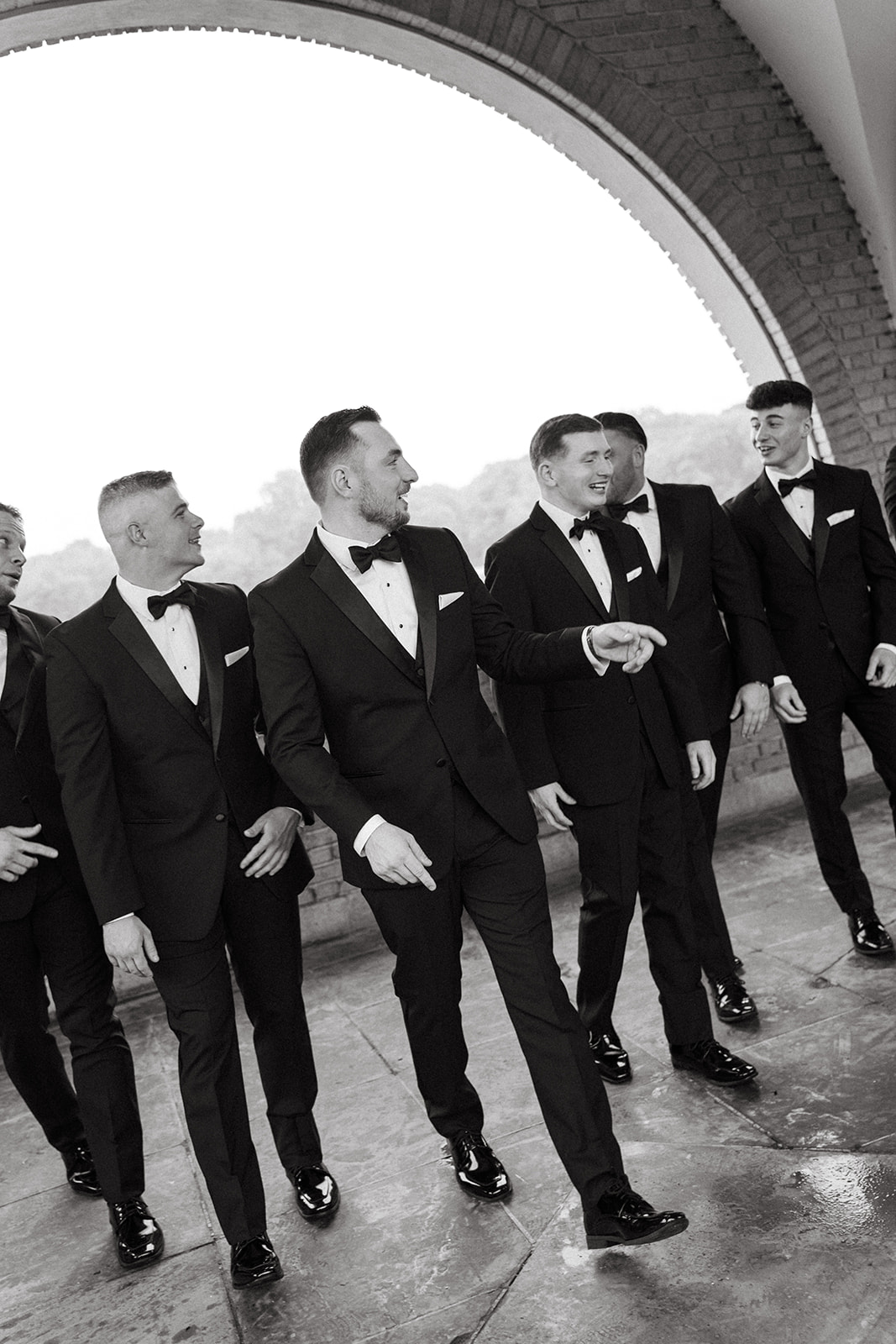 groom and groomsmen in tuxedos