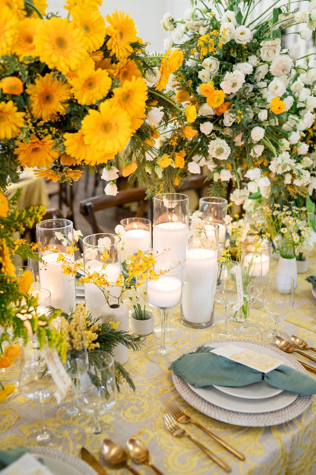 yellow and white centerpieces