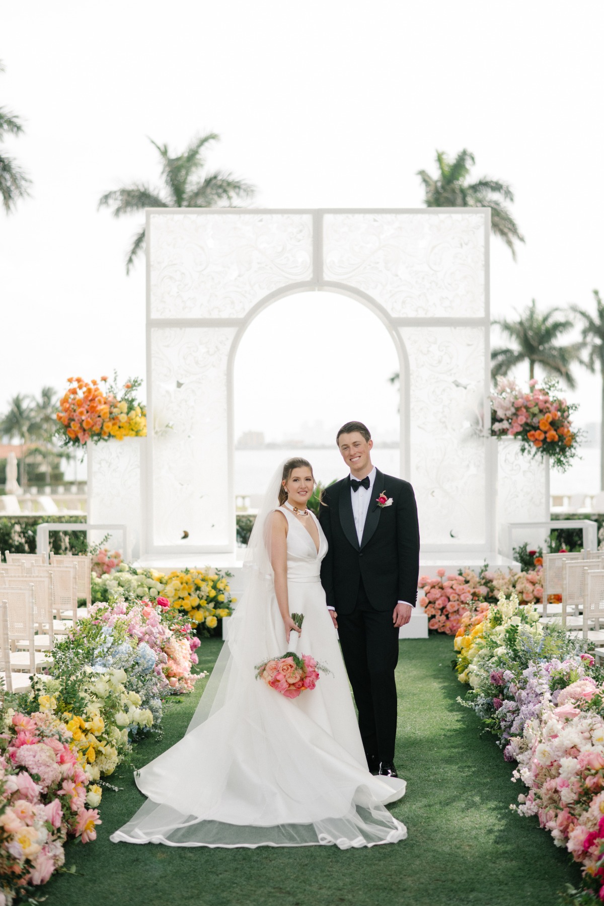 bride and groom at bayfront miami rainbow ceremony