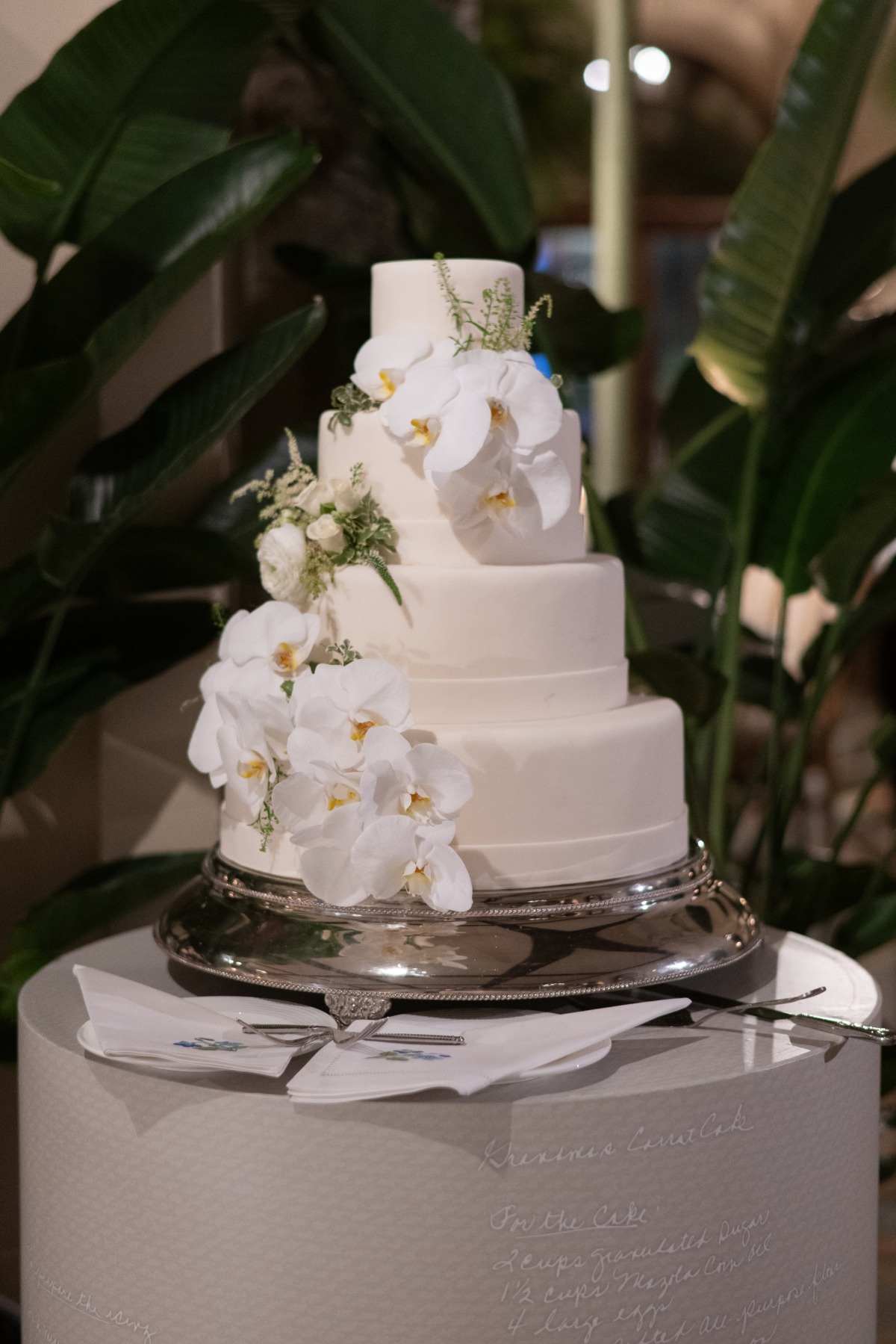 simple wedding cake with live orchid accents